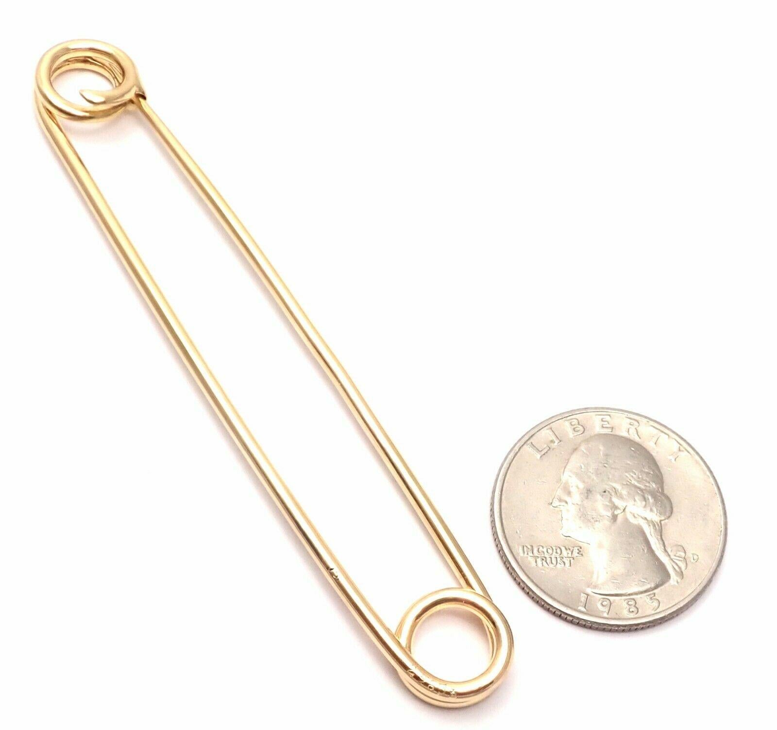 large gold safety pins