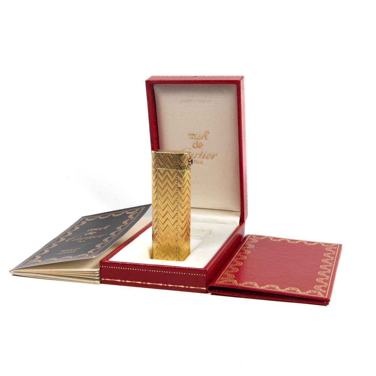 Vintage Red Lacquer Gold Plated Cartier Les Must lighter

This Gold-plated Cartier Les must lighter is indeed eye candy, featuring a Sapphire set on the cap. Fully functional, sparks excellent, and lights every time. The lighter is in absolutely