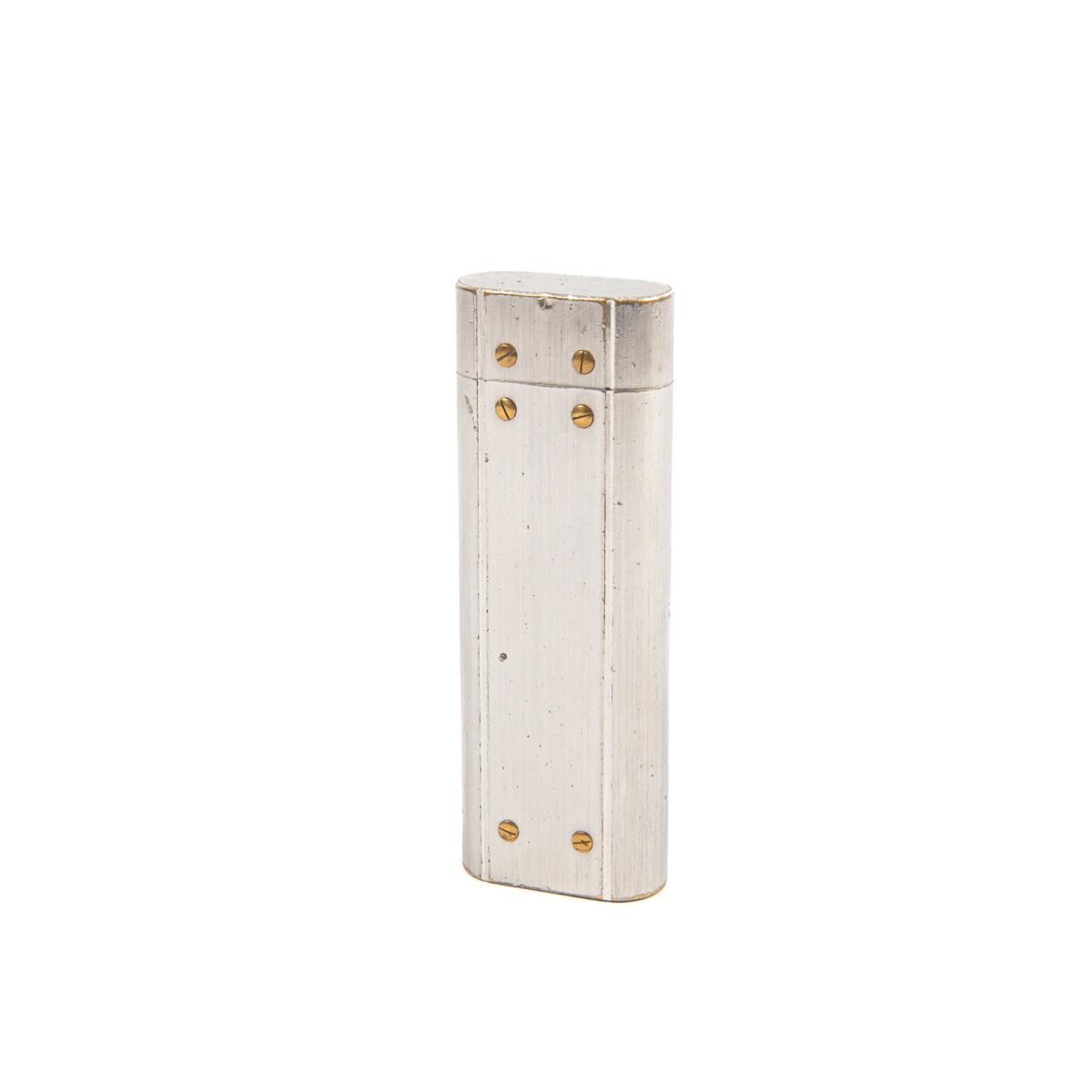 Vintage Cartier Les Must Santos lighter Silver Plated

This silver-plated Cartier Santos lighter is something unique. It is fully functional, sparks excellent, and lights every time. Approximately sold in the 1970s. The lighter is in absolutely