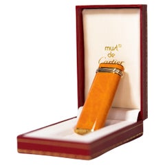 Encendedor Vintage Cartier Les Must Trinity Chapado en Oro con Laca Naranja