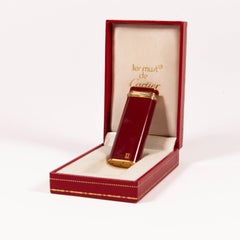 Vintage Cartier Les Must Trinity accendino placcato oro con lacca rossa in confezione