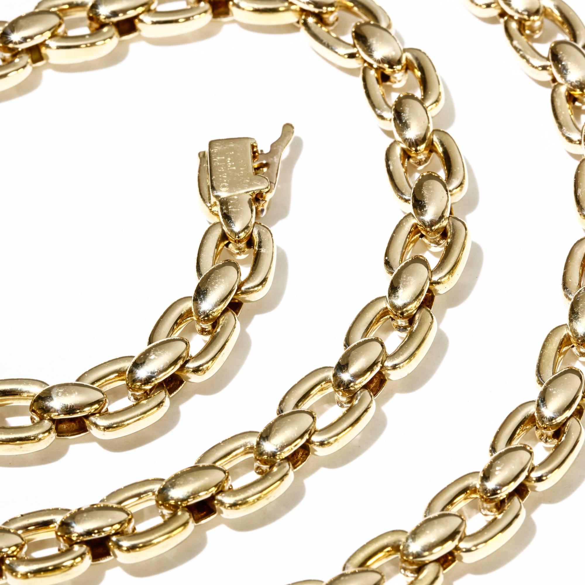 This vintage Cartier link necklace is solid 18k yellow gold and measures 23 inches long. All Cartier engraving is intact. It was made in 1991. It shows very minor signs of wear and has never been polished. 