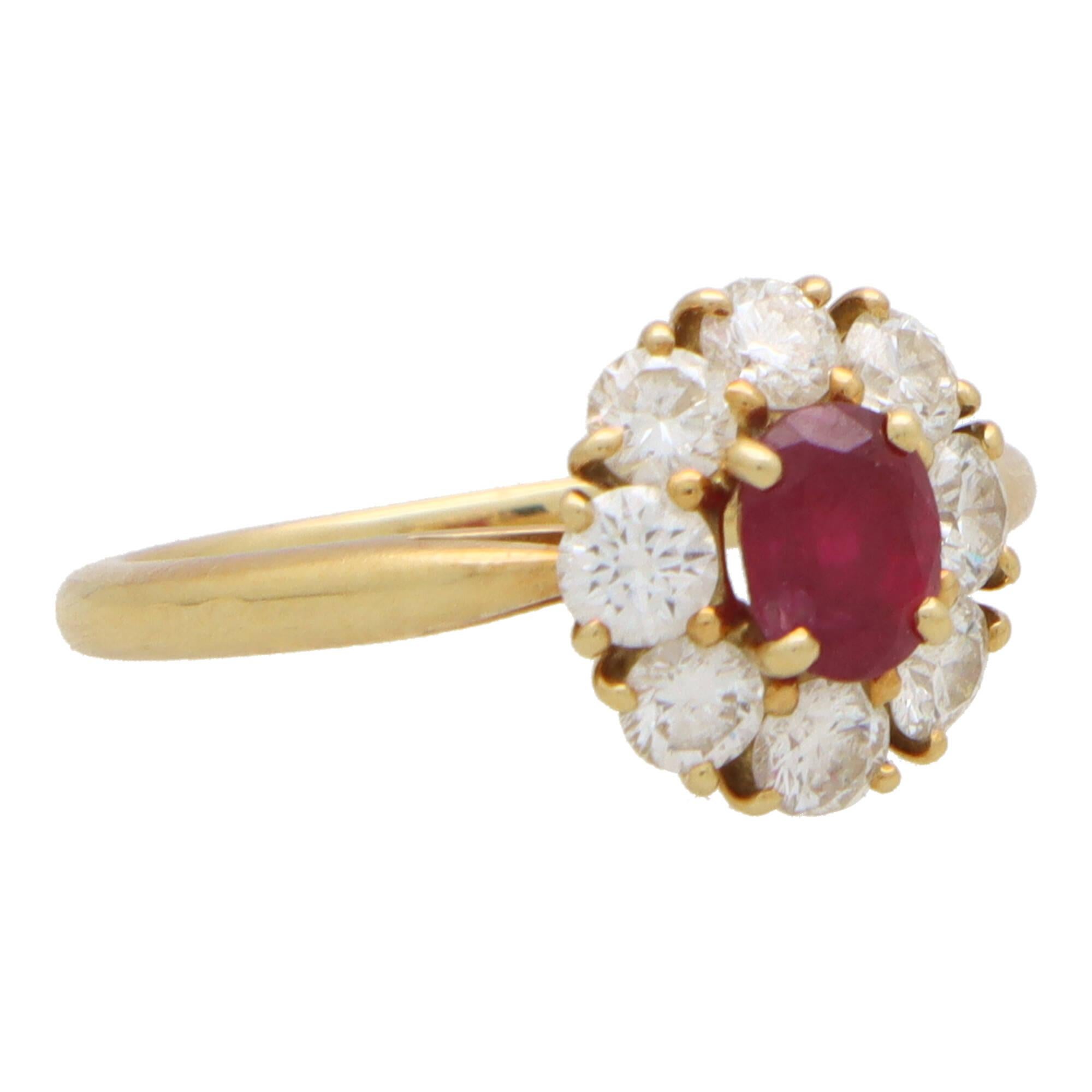 A beautiful vintage Cartier ruby and diamond cluster ring set in 18k yellow gold.

The piece is centrally set with a vibrant oval cut ruby which is four-claw set securely. The ruby has a fantastic colouring to it and is surrounded by a cluster of 8