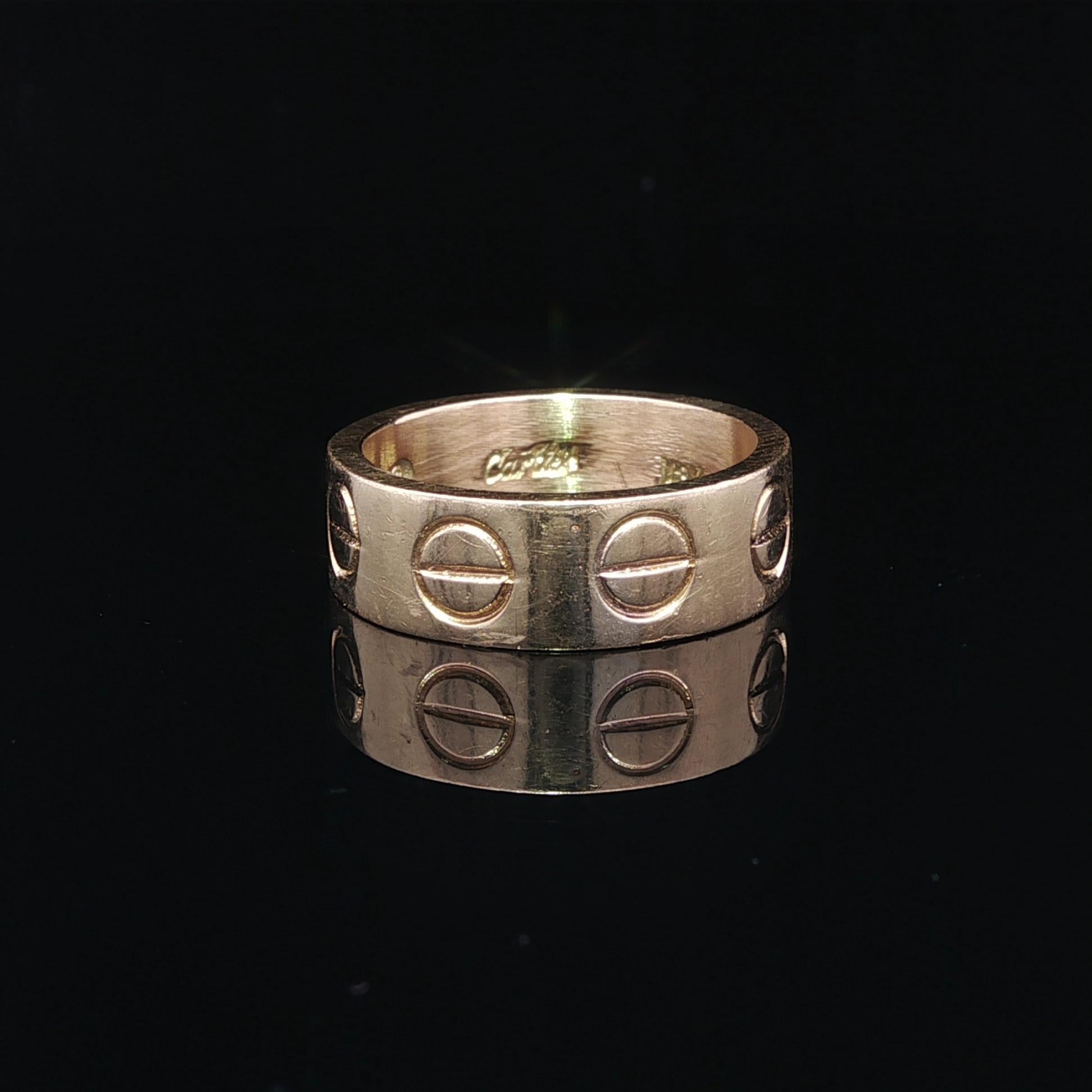 Material: Solid 18k Yellow Gold
Weight: 8.62 Grams
Ring Size: 5.5 (We CANNOT custom size this ring)
Ring Width: 6.2mm (0.24