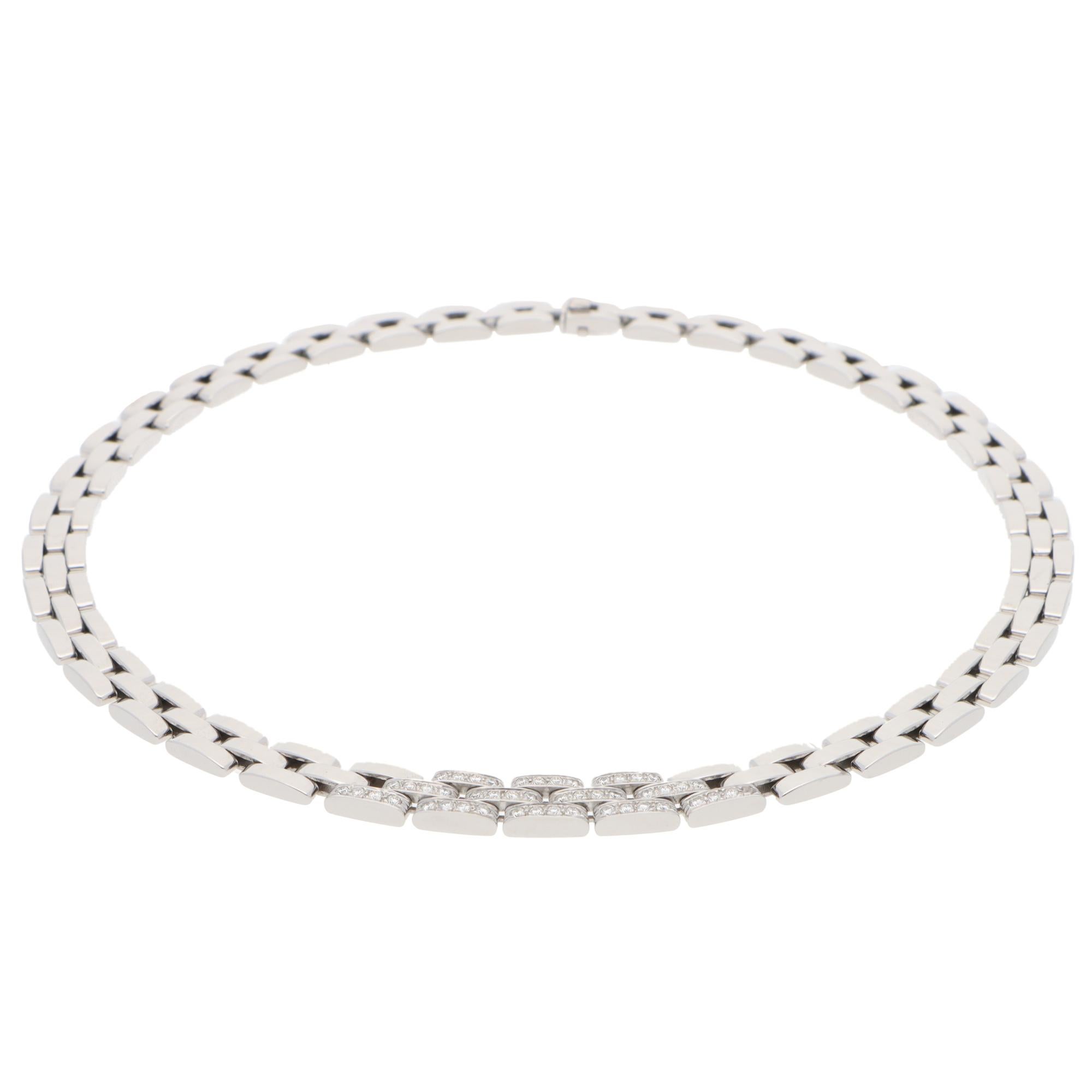 A beautiful vintage Cartier Tyrana Maillon Panthère diamond necklace set in 18k white gold.

The necklace is composed of solid white gold flat links, connected in the iconic Maillon Panthère brick link design. This particular design is the three-row
