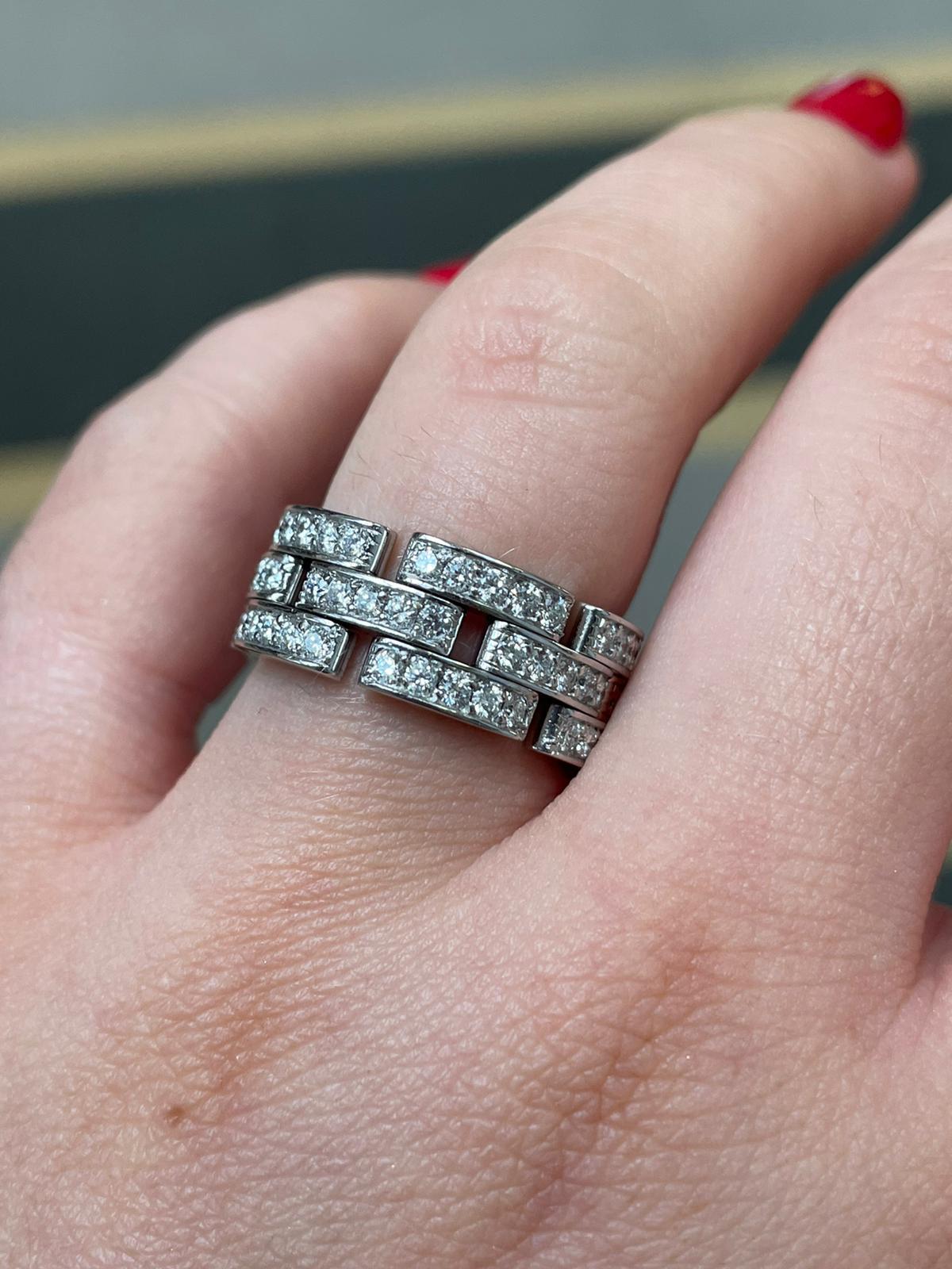 A beautiful Cartier Maillon Panthère diamond set ring, crafted in 18 karat white gold, circa 2010.

The Panthère collection is named after Cartier's iconic mascot, this couldn't be more appropriate as the ring drapes elegantly over the finger of the
