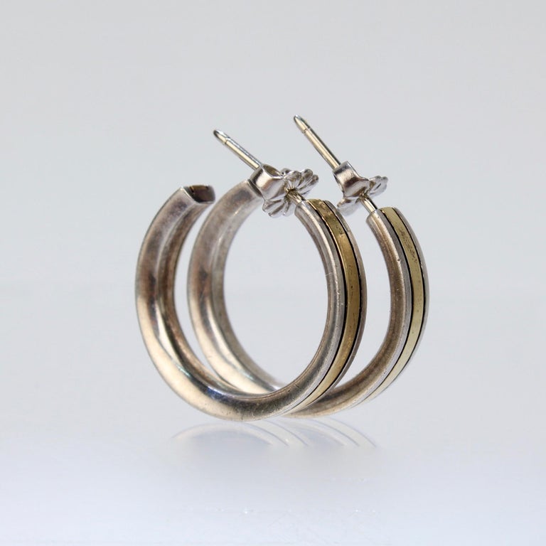 Vintage Cartier Mixed Metal 18 Karat Gold and Sterling Silver Hoop Earrings  at 1stDibs