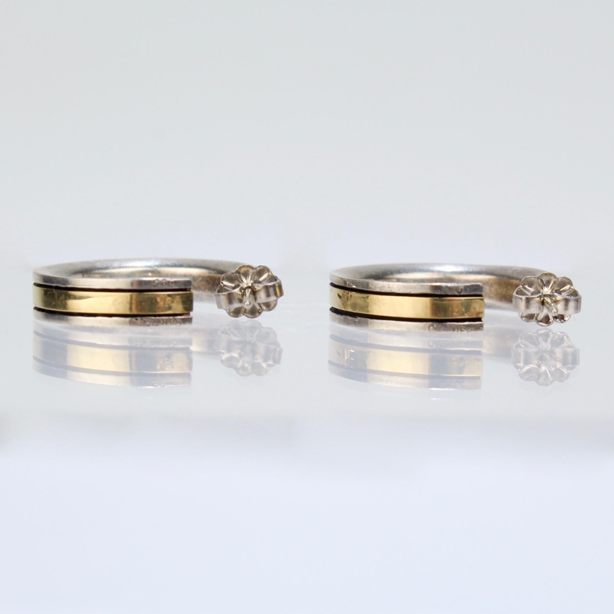 Modern Vintage Cartier Mixed Metal 18 Karat Gold and Sterling Silver Hoop Earrings