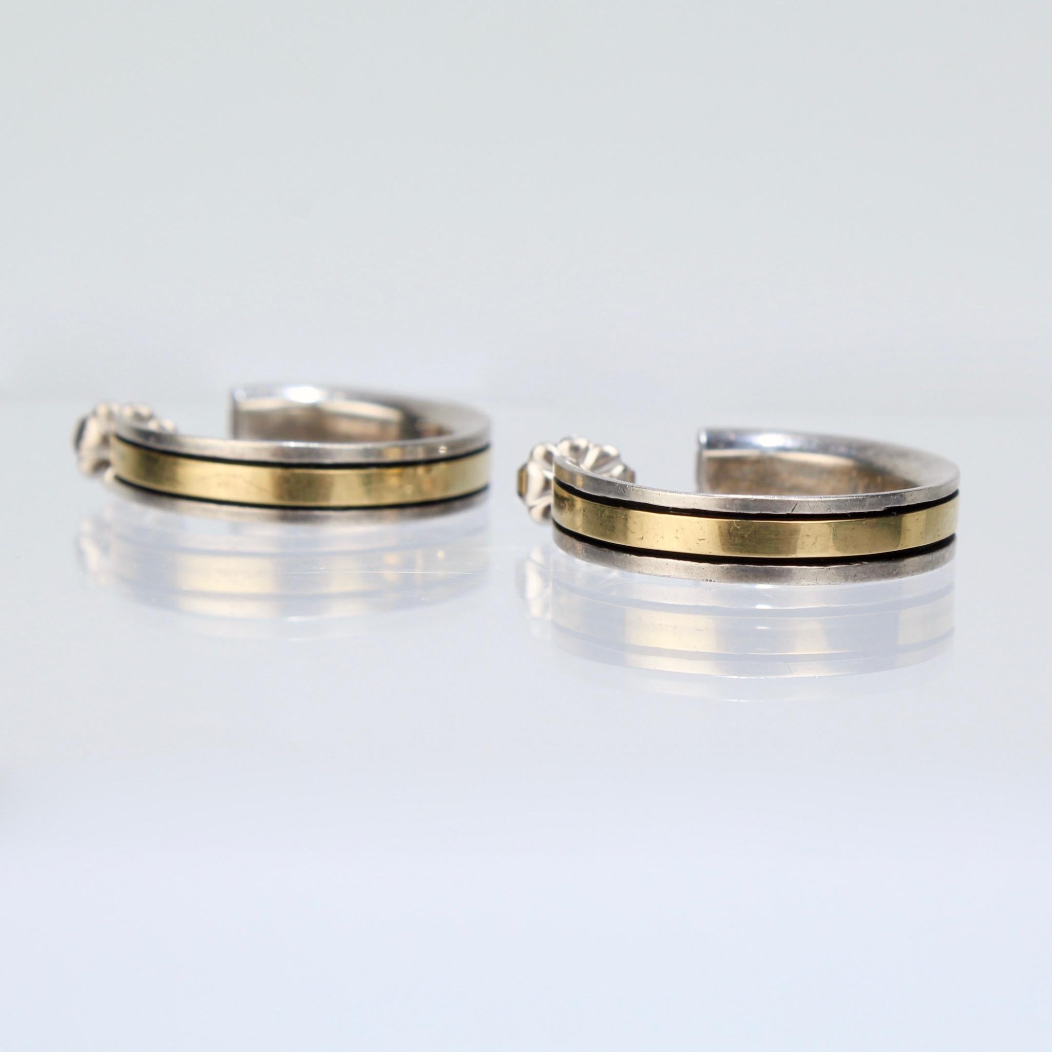 Vintage Cartier Mixed Metal 18 Karat Gold and Sterling Silver Hoop Earrings In Good Condition In Philadelphia, PA