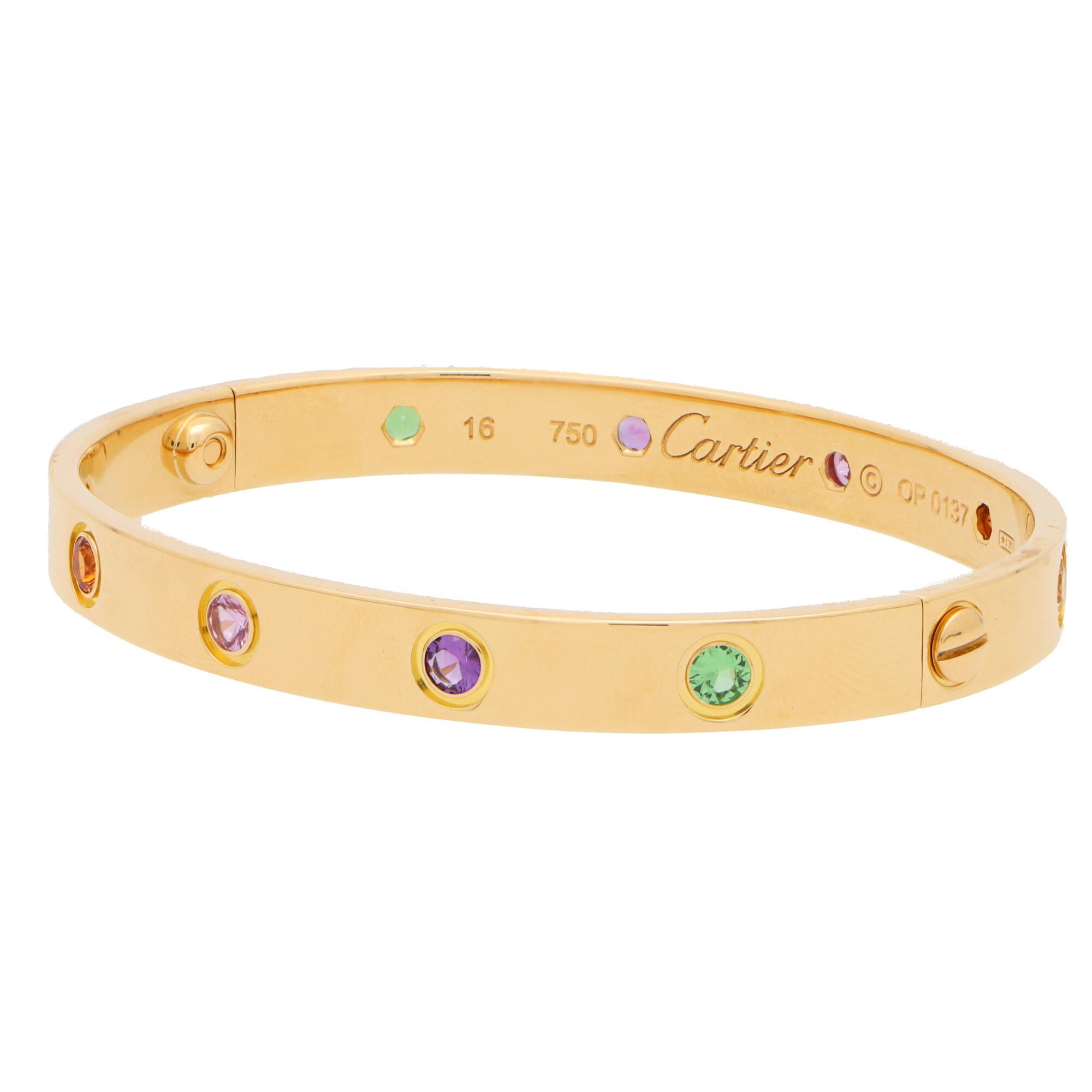 A classic vintage Cartier gem set Love bangle set in 18k yellow gold.

The Love collection is a firm favorite of many mainly due to the simple, beautiful and elegant design. The bangle is composed of a 6-millimetre band with ten individual stones