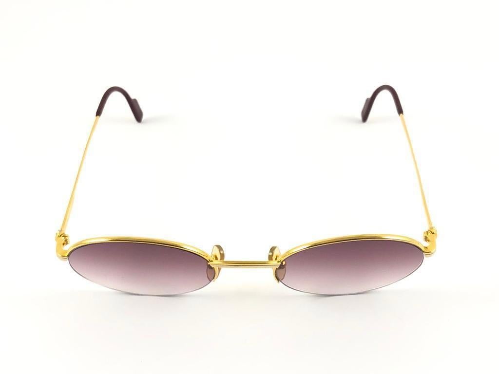 Marrone Occhiali da sole vintage Cartier Oval Gold Manhattan 51mm con montatura placcata 18k Francia in vendita