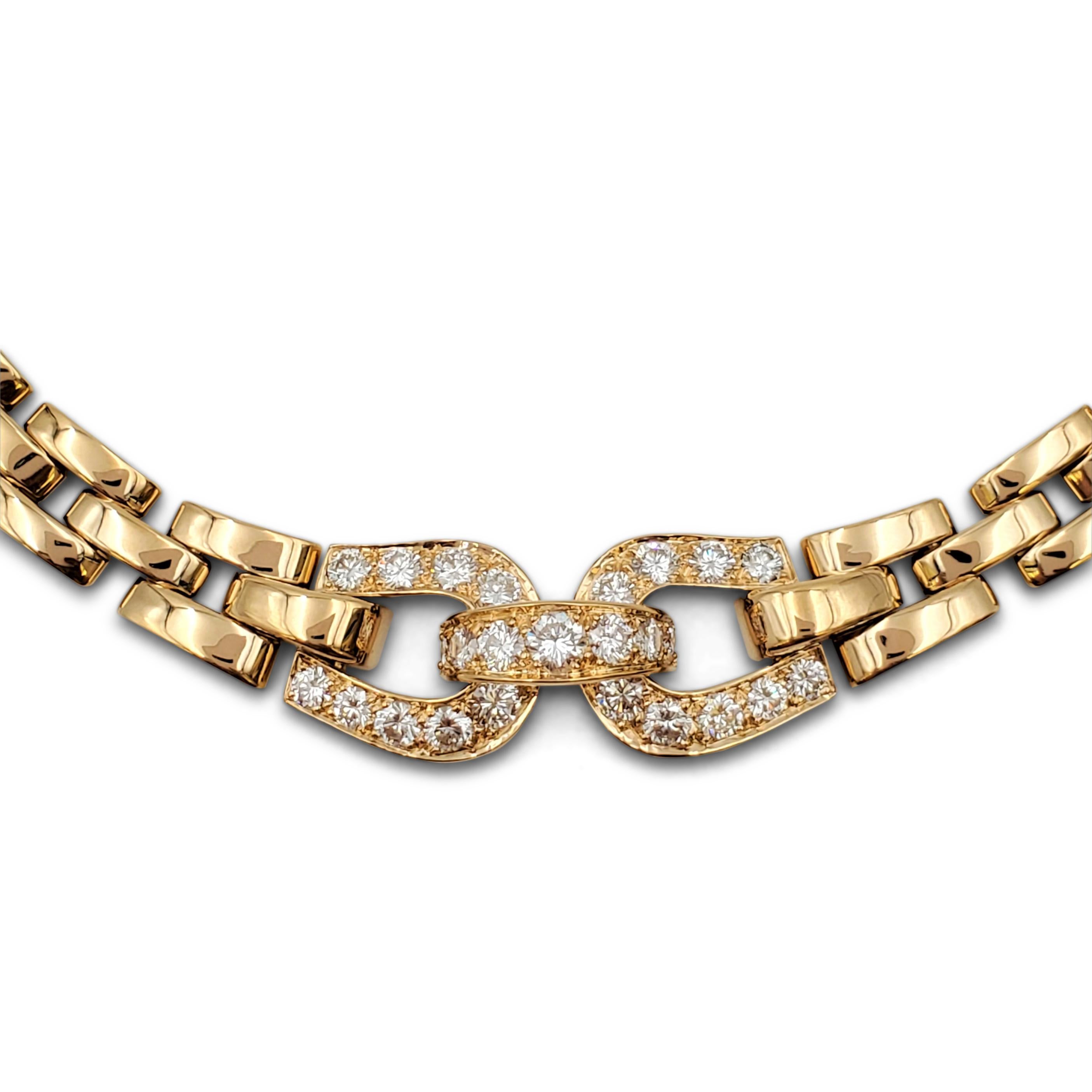 Authentic vintage Cartier 'Panthere Maillon' necklace crafted in 18 karat yellow gold is comprised of three uniform incurved links. The necklace centers on two horseshoe-shaped motifs connected by a curved link set with high-quality round brilliant
