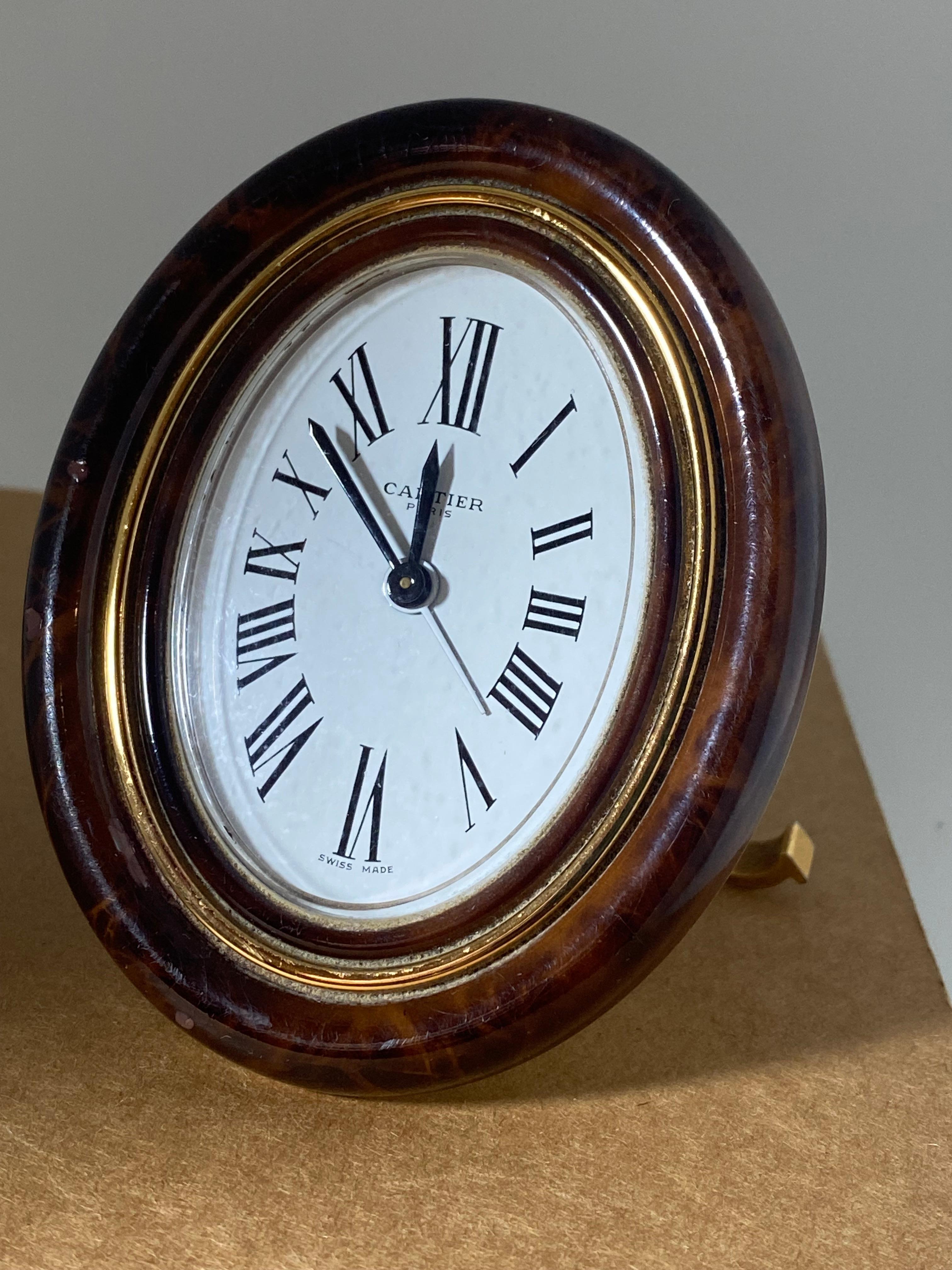 Associated with class, sophistication & precise timekeeping, 
Cartier has made this desk clock during 1980's 

Signed 