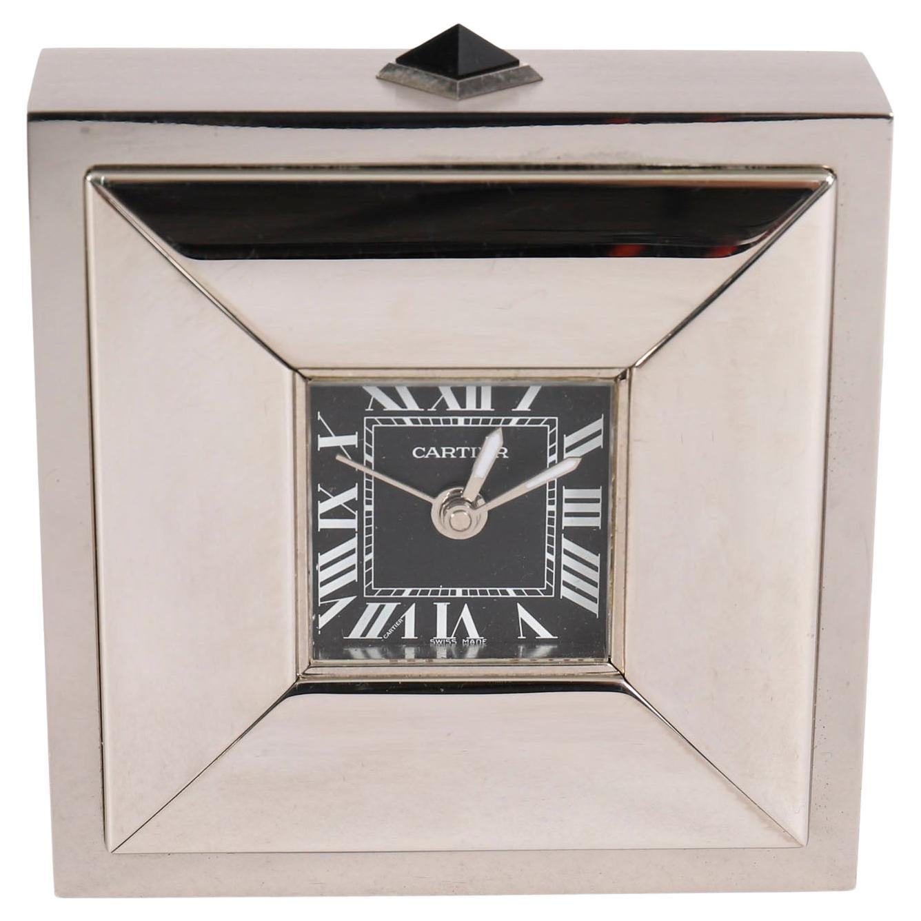 How do I program an Arne Jacobsen Roman table clock?