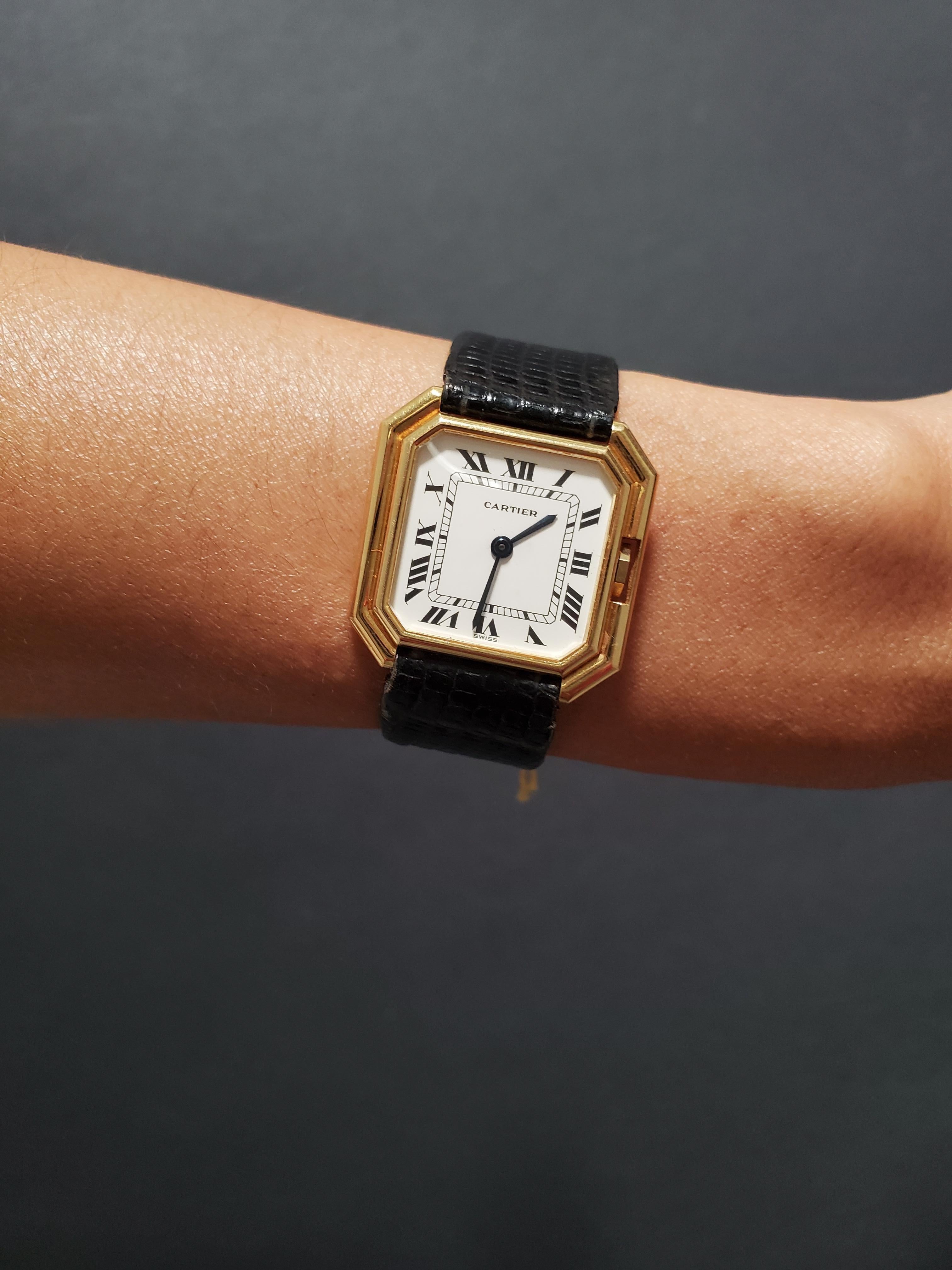 Introduction:
This Vintage Cartier Paris Centure Octagon Shape watch is the medium size, circa 1975-1980.  It is made in 18K yellow gold and measures 28 x 28 mm with a mechanical manual wind 17-jewel movement.  It has the  black lizard strap with 