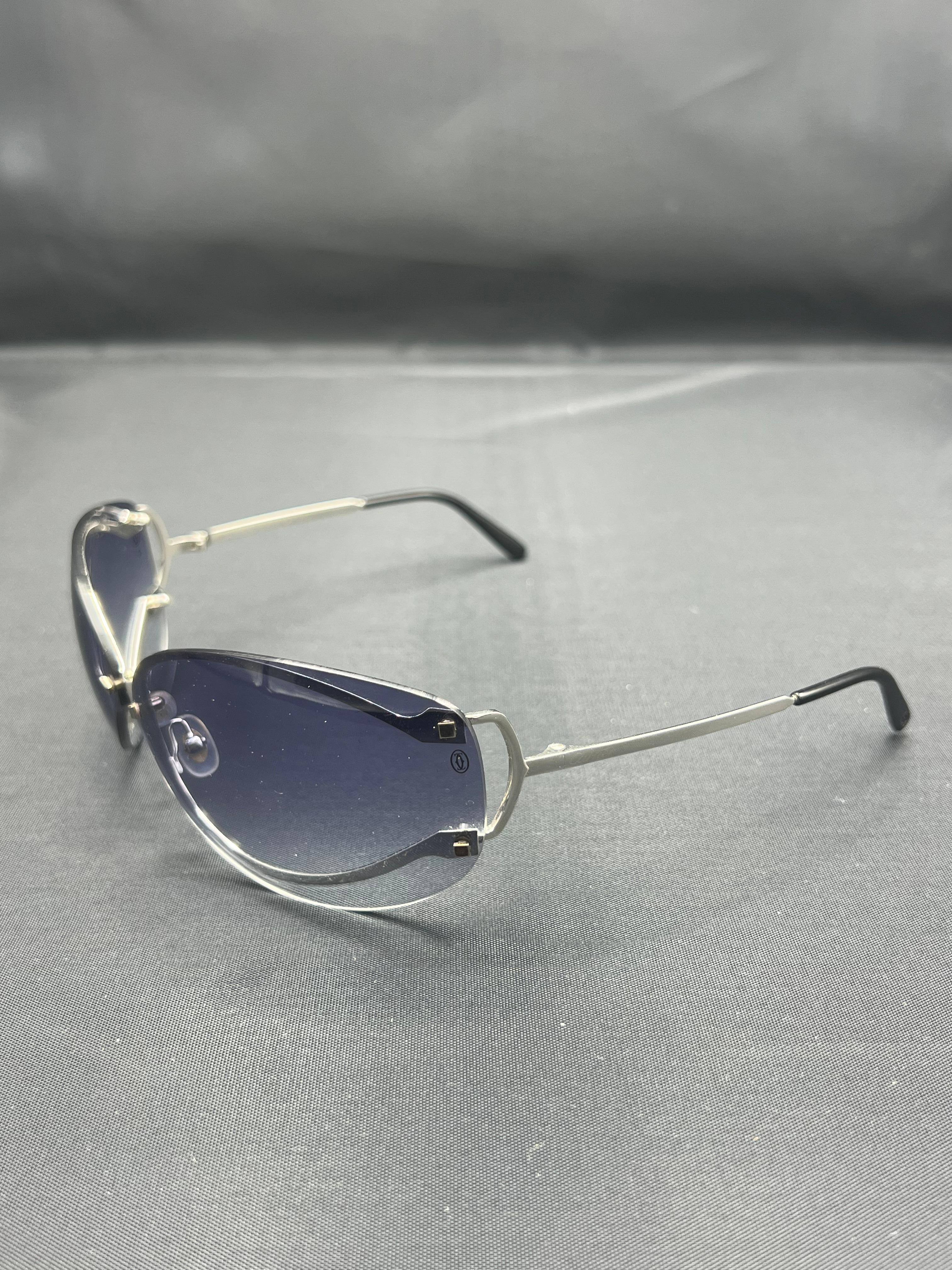 - Silver tone hardware
- Navy gradient lenses
- Oval/ cat-eye shape
- Made in France 