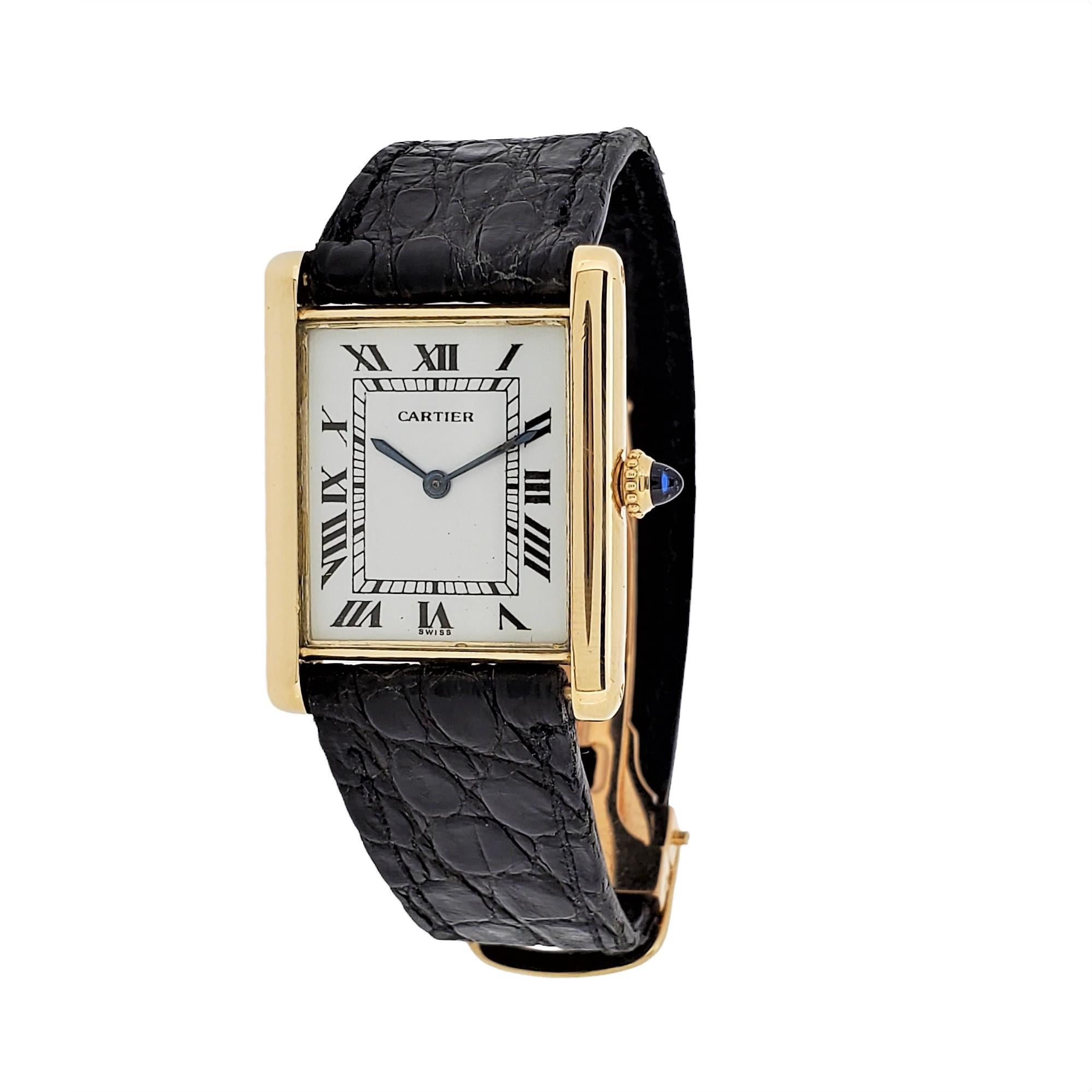 Introduction:
Cartier Paris Vintage Tank LC GM Extra Thin, Large size made in 18K yellow 1st series, Circa 1975-1980.  The watch measures 24 x 30 x 4.4mm thick.  The watch is accompanied with a Cartier Deployant buckle, and strap.  The watch is