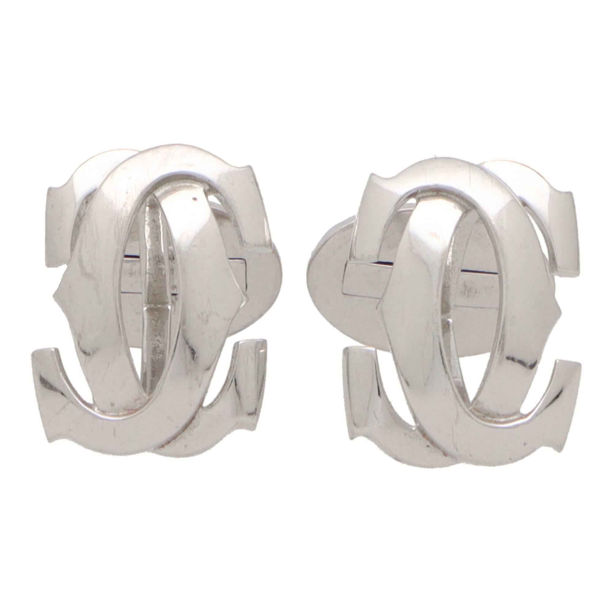 A unique pair of vintage Cartier ‘Penelope’ logo swivel back cufflinks set in 18k white gold.

From the now discontinued ‘Penelope’ collection, each cufflink is composed of the iconic Cartier double C logo motif. The cufflinks are secured with a