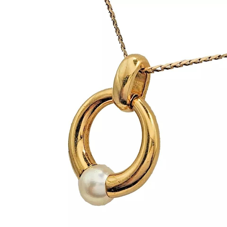 This vintage Cartier necklace is a stunning piece of fine jewellery that is sure to catch the eye. Crafted in 18K solid yellow gold, it features a beautiful pearl design that is part of the Cartier Perla collection. The necklace is perfect for those