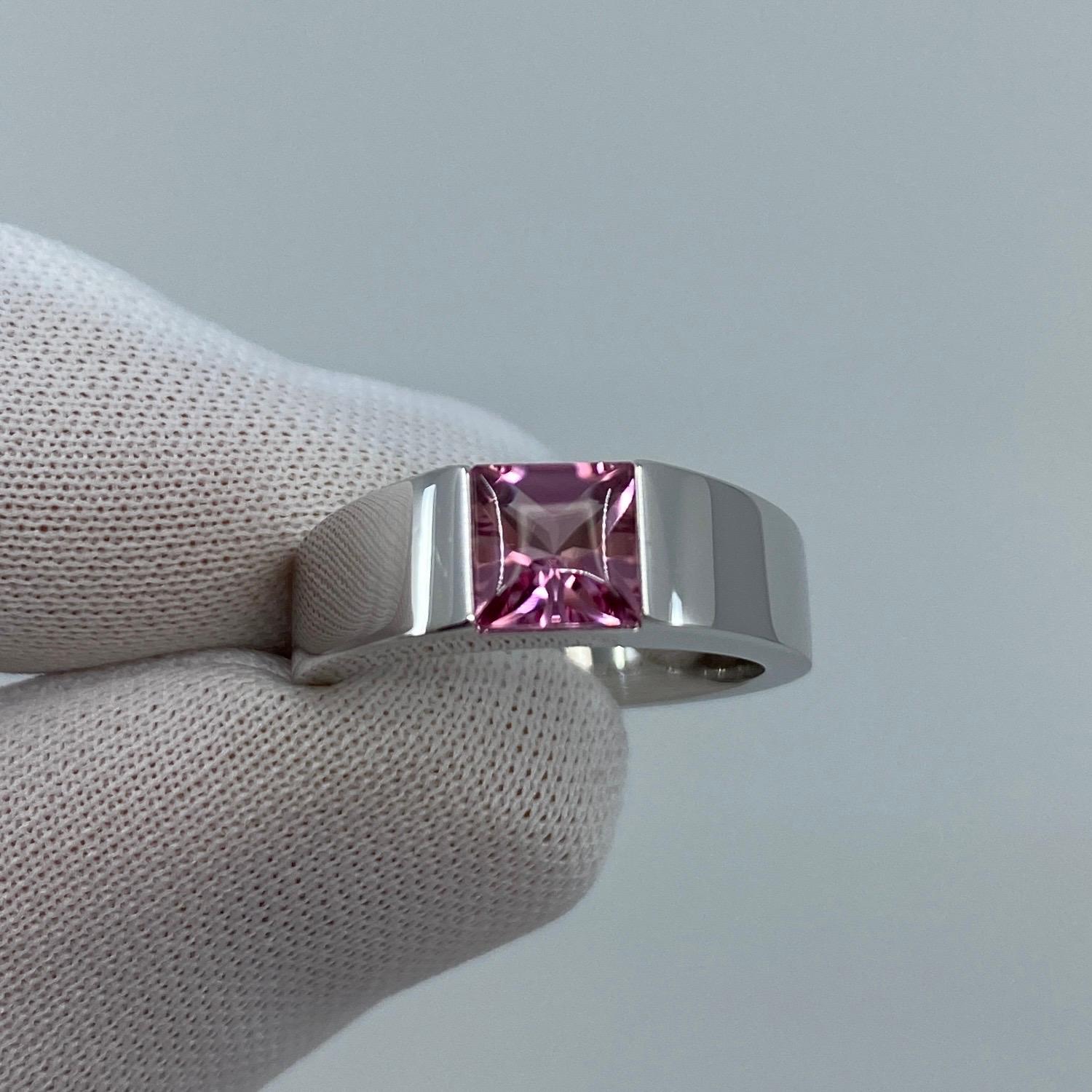 Vintage Cartier Pink Tourmaline 18 Karat White Gold Tank Ring.

Stunning white gold ring with a 5.8mm tension set bright pink fancy-cut tourmaline. Fine jewellery houses like Cartier only use the finest of gemstones and this tourmaline is no