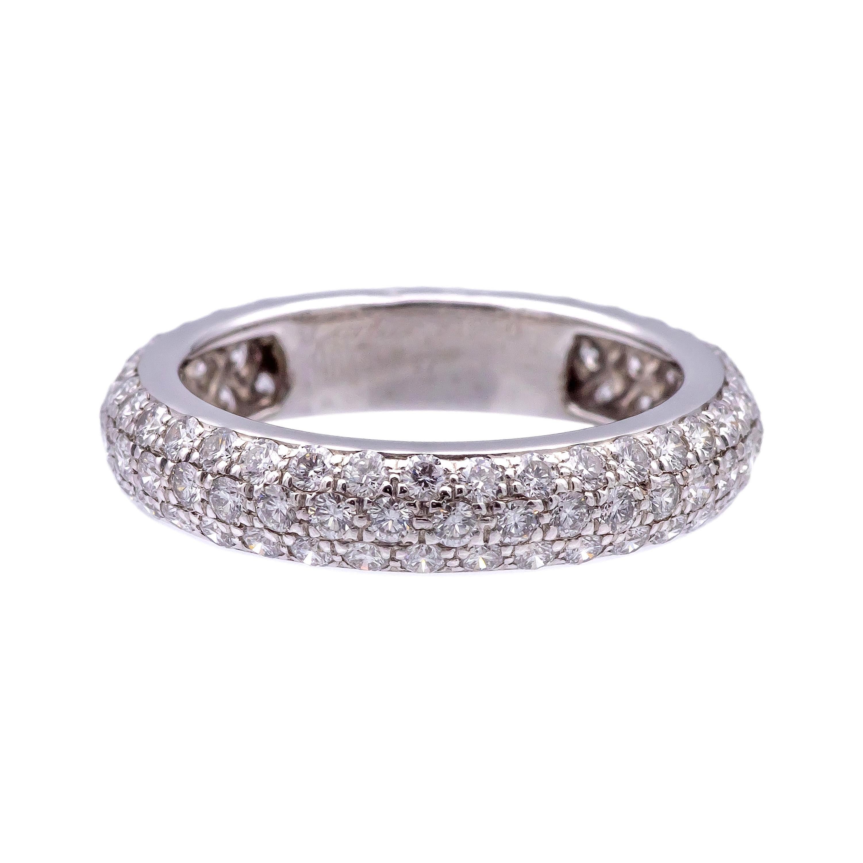 Vintage Cartier 3 row diamond pave band ring finely crafted in platinum featuring 3 rows of pave set high-quality round brilliant cut diamonds weighing 1.36 carats total weight. Ring has a domed design and is fully hallmarked.  Original Cartier