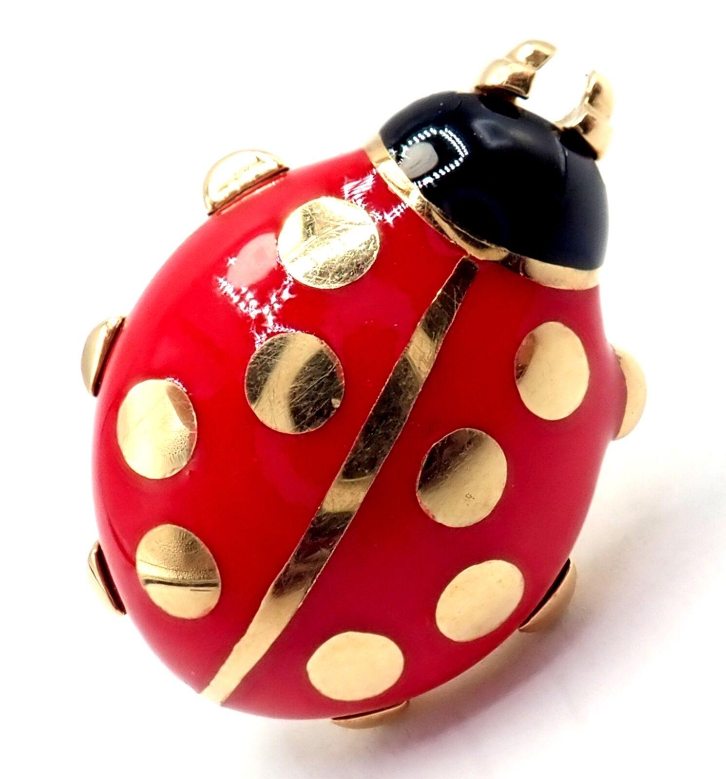 18k Yellow Gold Red Enamel Ladybug Tie Lapel Pin by Cartier. 
The Vintage Cartier Ladybug 18k Yellow Gold Red Enamel Pin Clip is a classic accessory crafted by the renowned jeweler. 
Made of 18k yellow gold, it features a ladybug motif.  
This