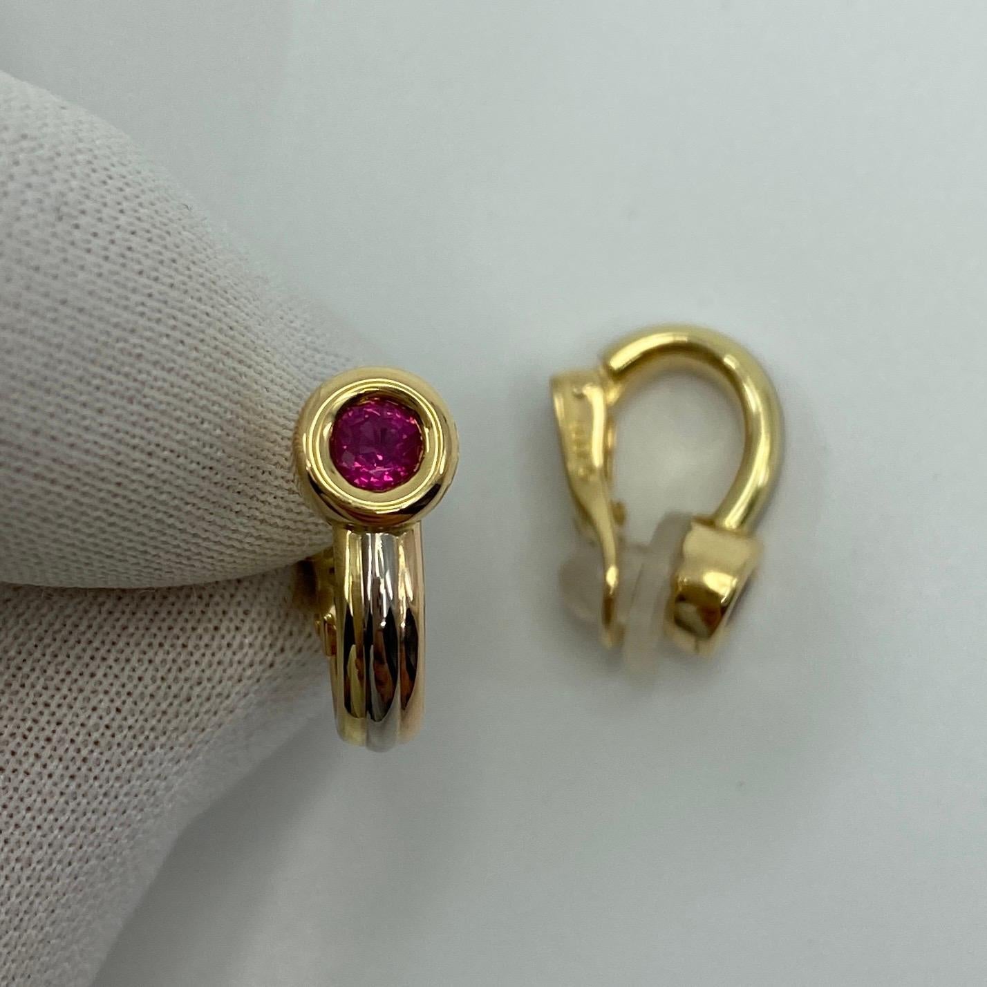 Vintage Cartier Vivid Red Ruby 18k Multi Tone Gold Hoop Earrings.

Beautiful earrings featuring stunning vivid red round cut rubies, bezel set in multi tone gold band hoops (yellow, white and rose gold)
Fitted with secure and comfortable clip-on