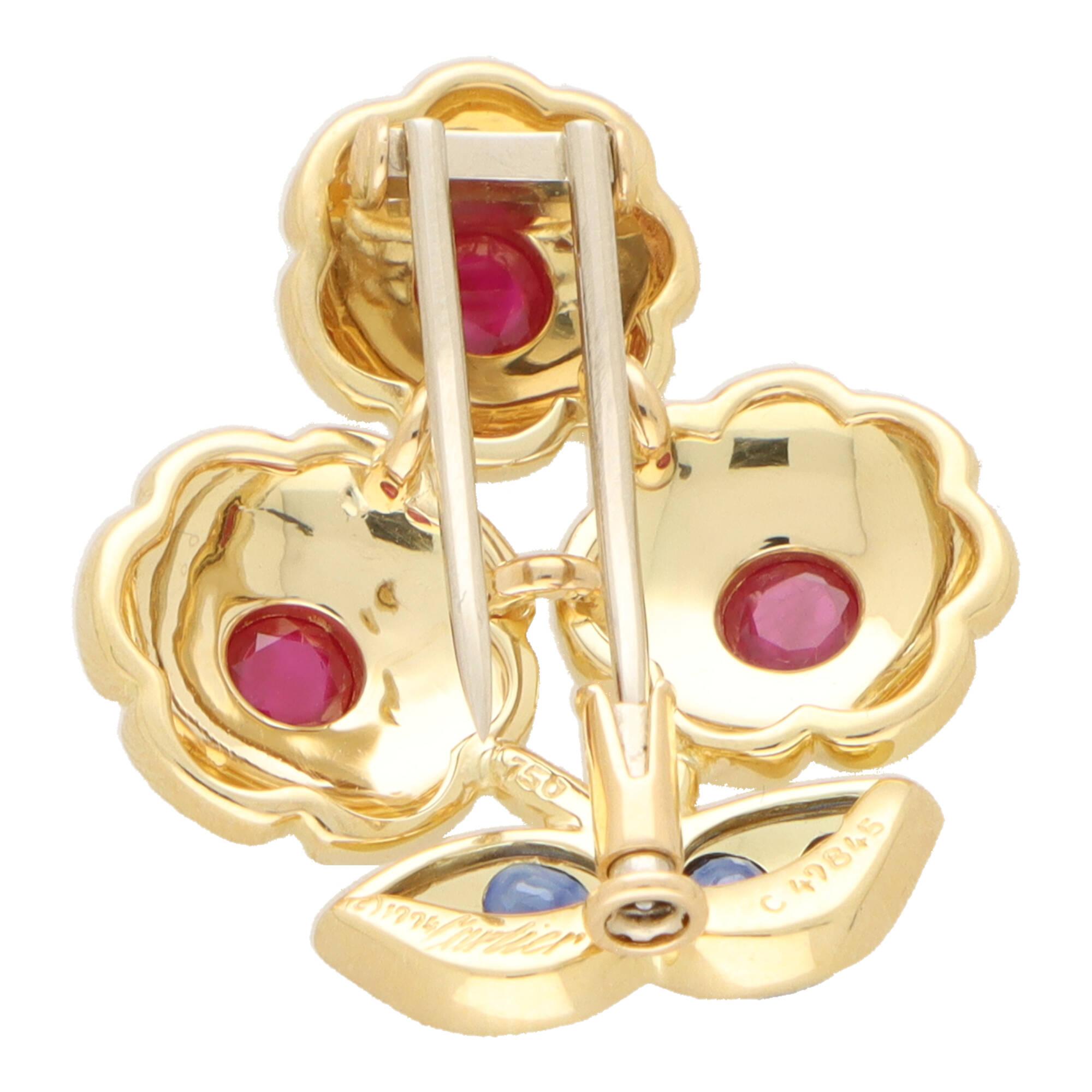 Cabochon Vintage Cartier Ruby and Blue Sapphire Flower Brooch For Sale