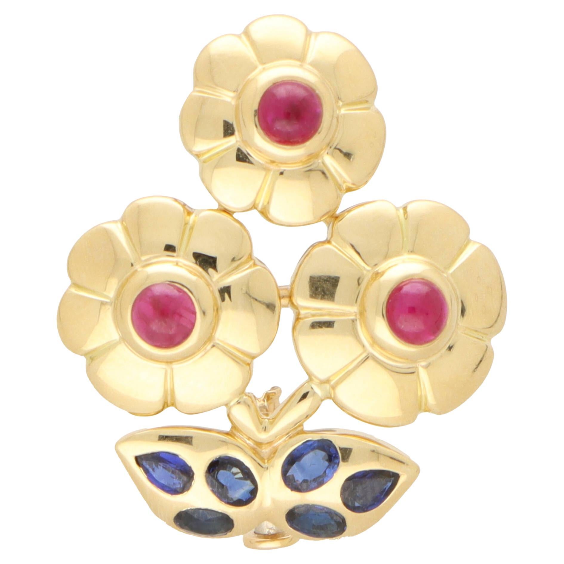 Vintage Cartier Ruby and Blue Sapphire Flower Brooch For Sale