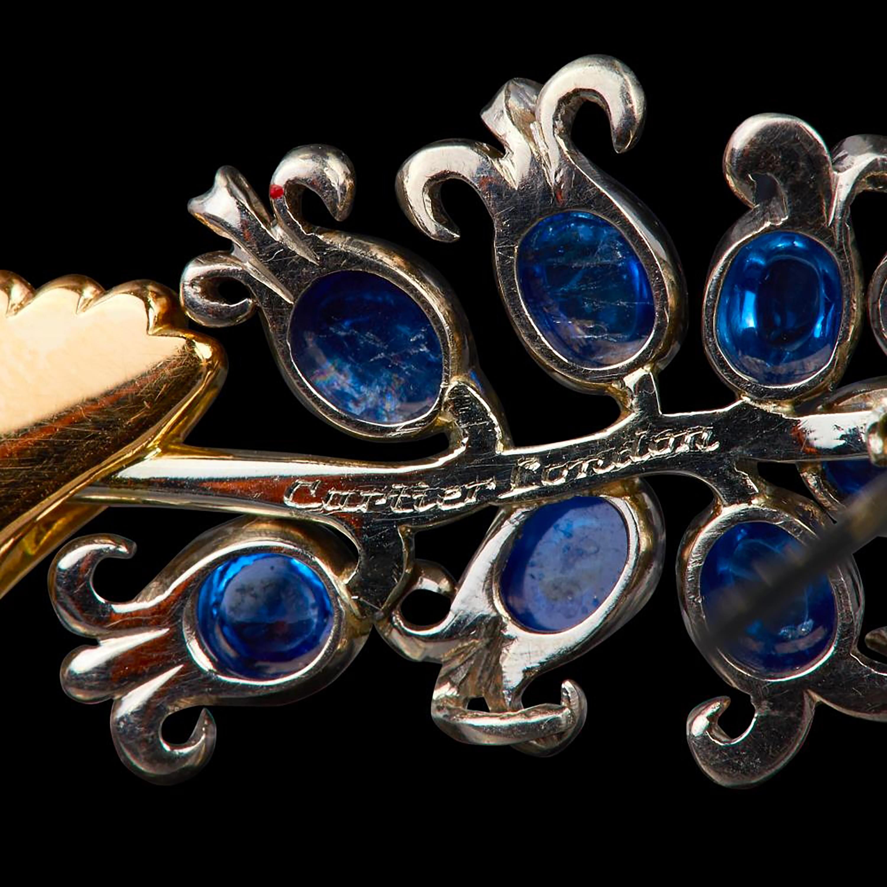 Women's or Men's Vintage Cartier London Sculpted Hand Holding Floral Brooch Cabochon Sapphires