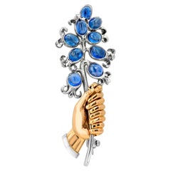 Vintage Cartier Sculpted Hand Holding Floral Brooch with Cabochon Sapphires