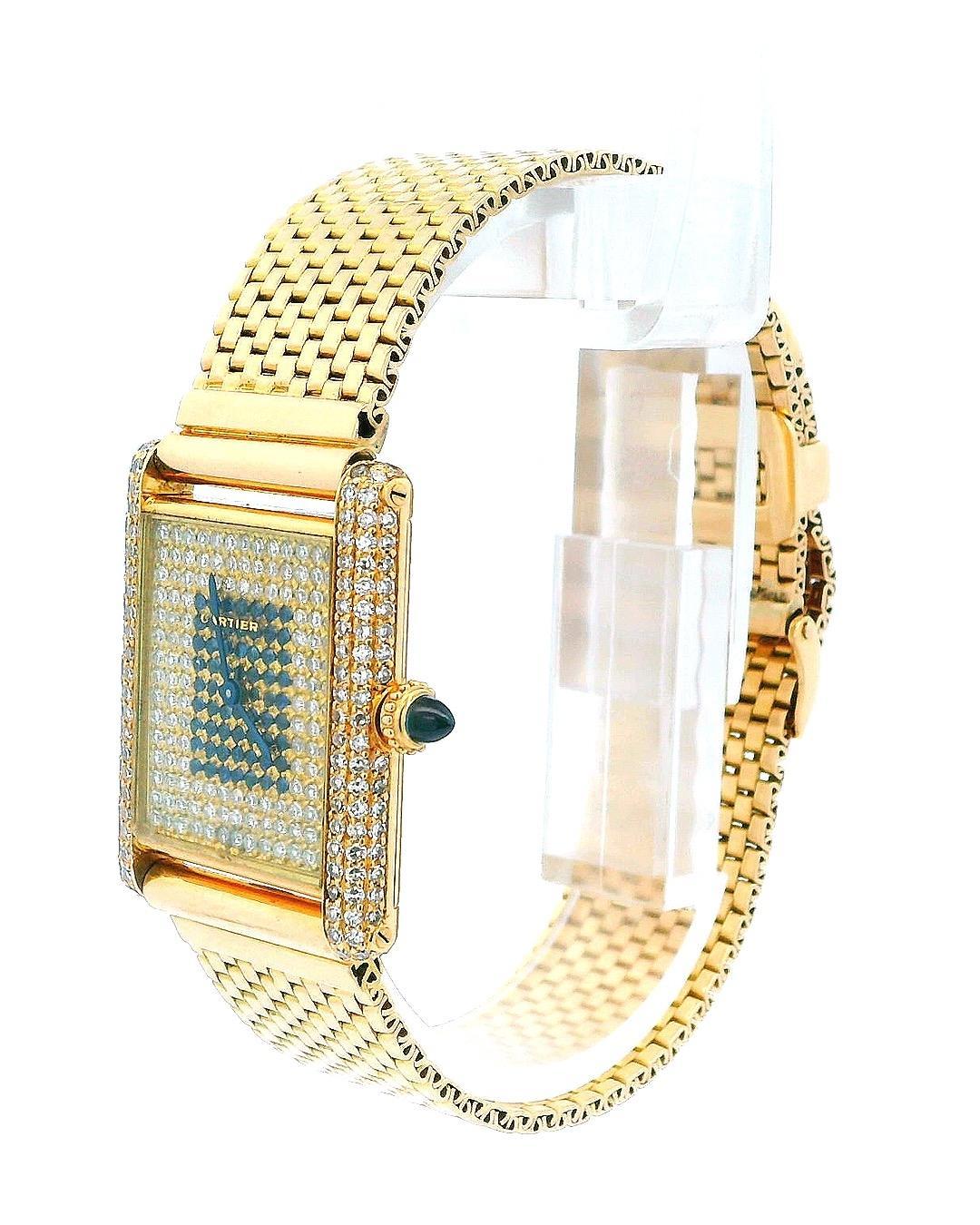 Cartier Tank Paris Damenuhr. 24mm 18K Gelbgold Gehäuse mit Fabrik Diamant Lünette. Fabrik pave Zifferblatt mit blauen Stahlzeigern. 18K Gelbgold zugeordnet Armband mit 18K Gelbgold Schnalle.... Passt bis zu einem Handgelenk von 7,25 Zoll.