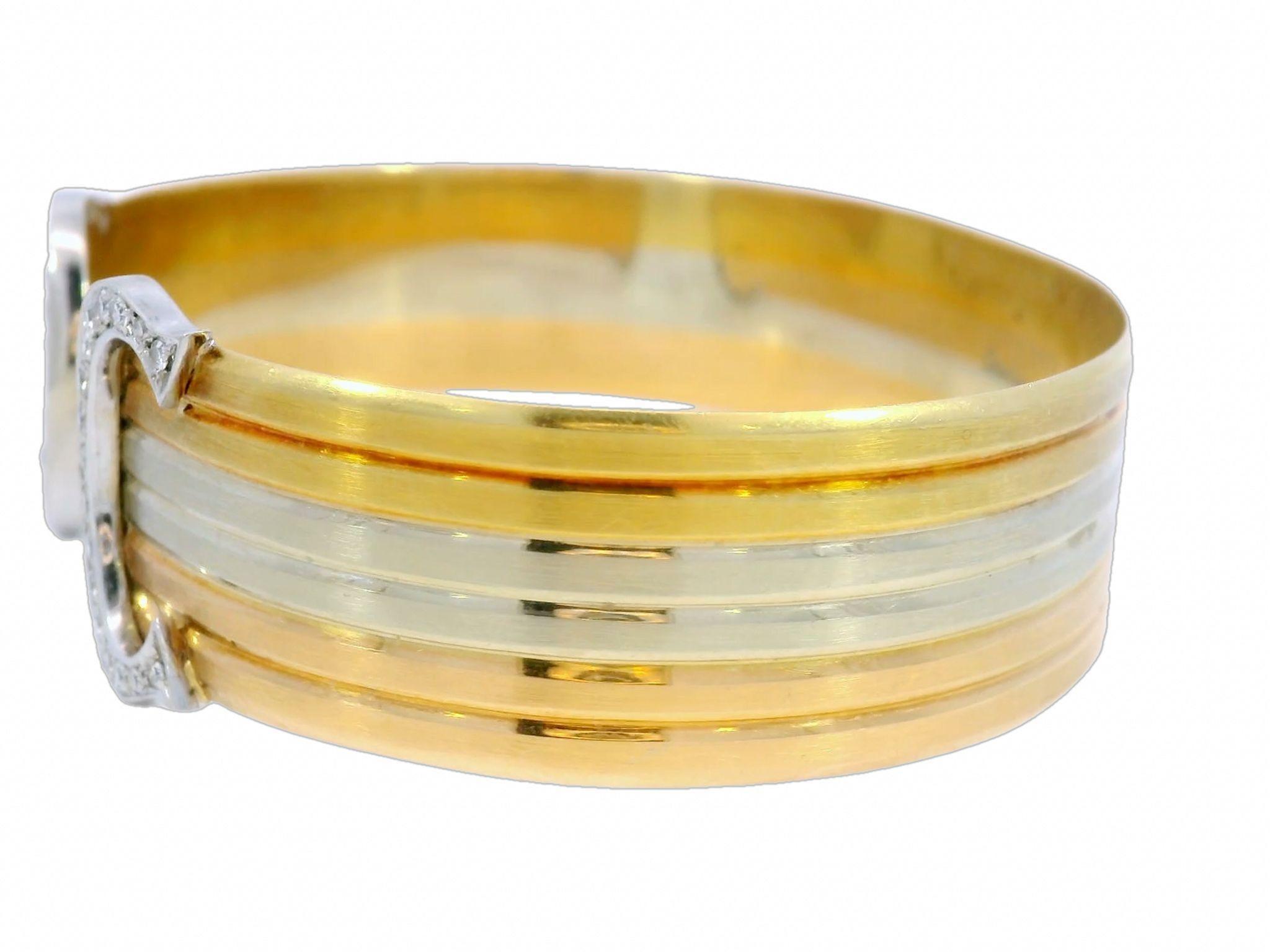 Vintage Cartier Tri Color Trinity Double C Diamant-Manschettenarmband aus 18 Karat Gold, dreifarbig

Das Cartier Tri-Color Trinity Diamond Double C Manschettenarmband aus warmem 18-karätigem Gelbgold hat ein einzigartiges Design, das sowohl schlicht
