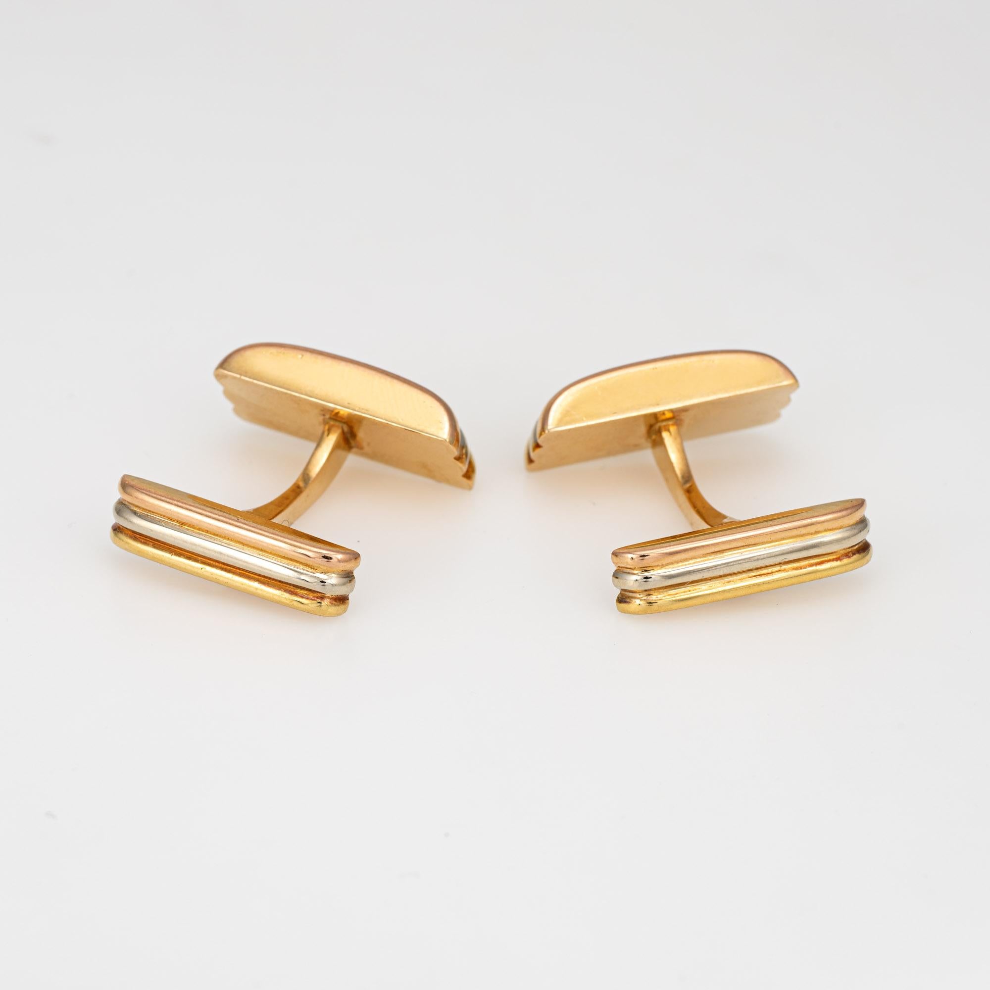 Out of production vintage Cartier Trinity cufflinks crafted in 18k yellow, rose & white gold (circa 1990s).  

The polished gold Cartier cufflinks feature the iconic Trinity design of yellow, white and rose gold, representing love, fidelity and