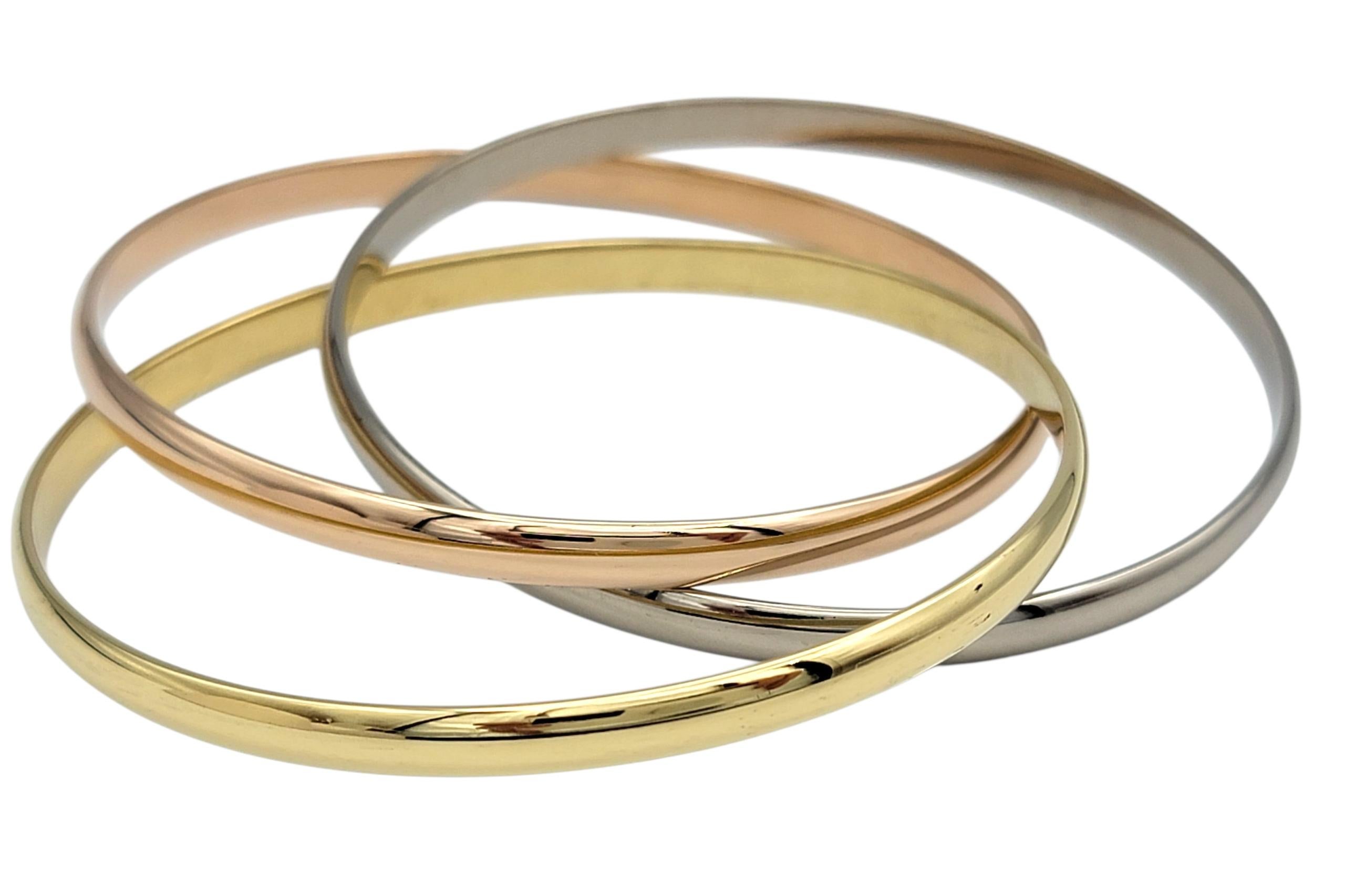 Vintage Cartier Trinity Interlocking Armreif Armbänder in Tri-Tone 18 Karat Gold für Damen oder Herren im Angebot