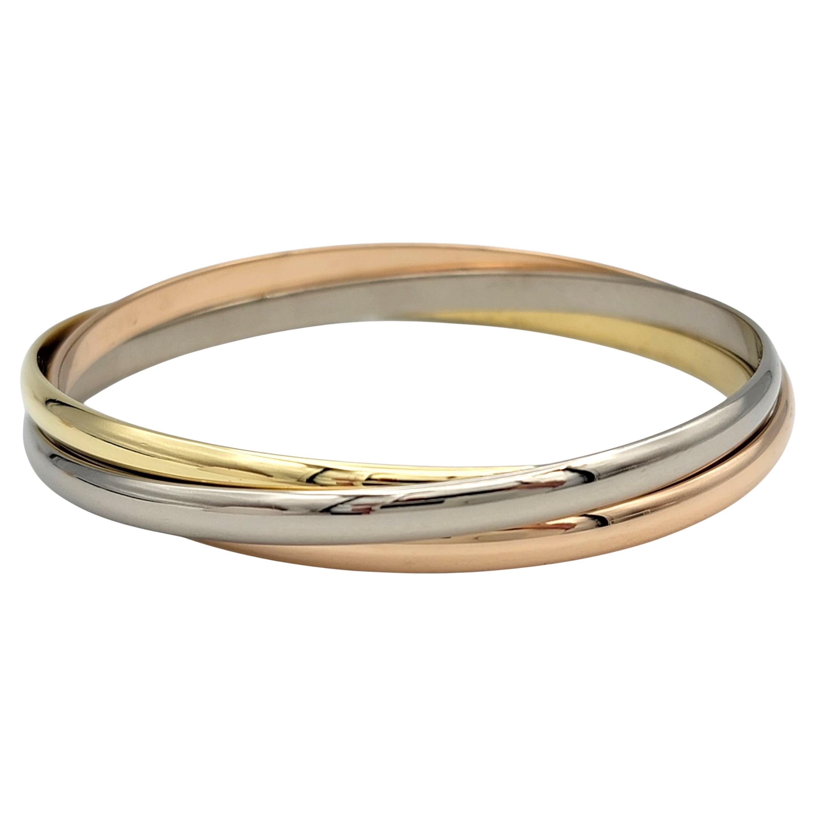 Vintage Cartier Trinity Interlocking Armreif Armbänder in Tri-Tone 18 Karat Gold im Angebot