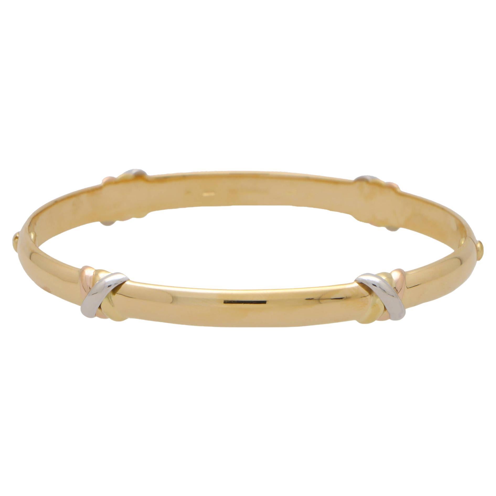 Vintage Cartier 'Trinity Kiss' Screw Bangle Set in 18k Yellow, Rose & White Gold For Sale