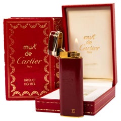 Accendino Cartier Trinity d'epoca laccato Bordeaux in scatola 1989