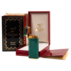 Mini encendedor vintage CARTIER Trinity lacado en mármol azul en caja Años 90