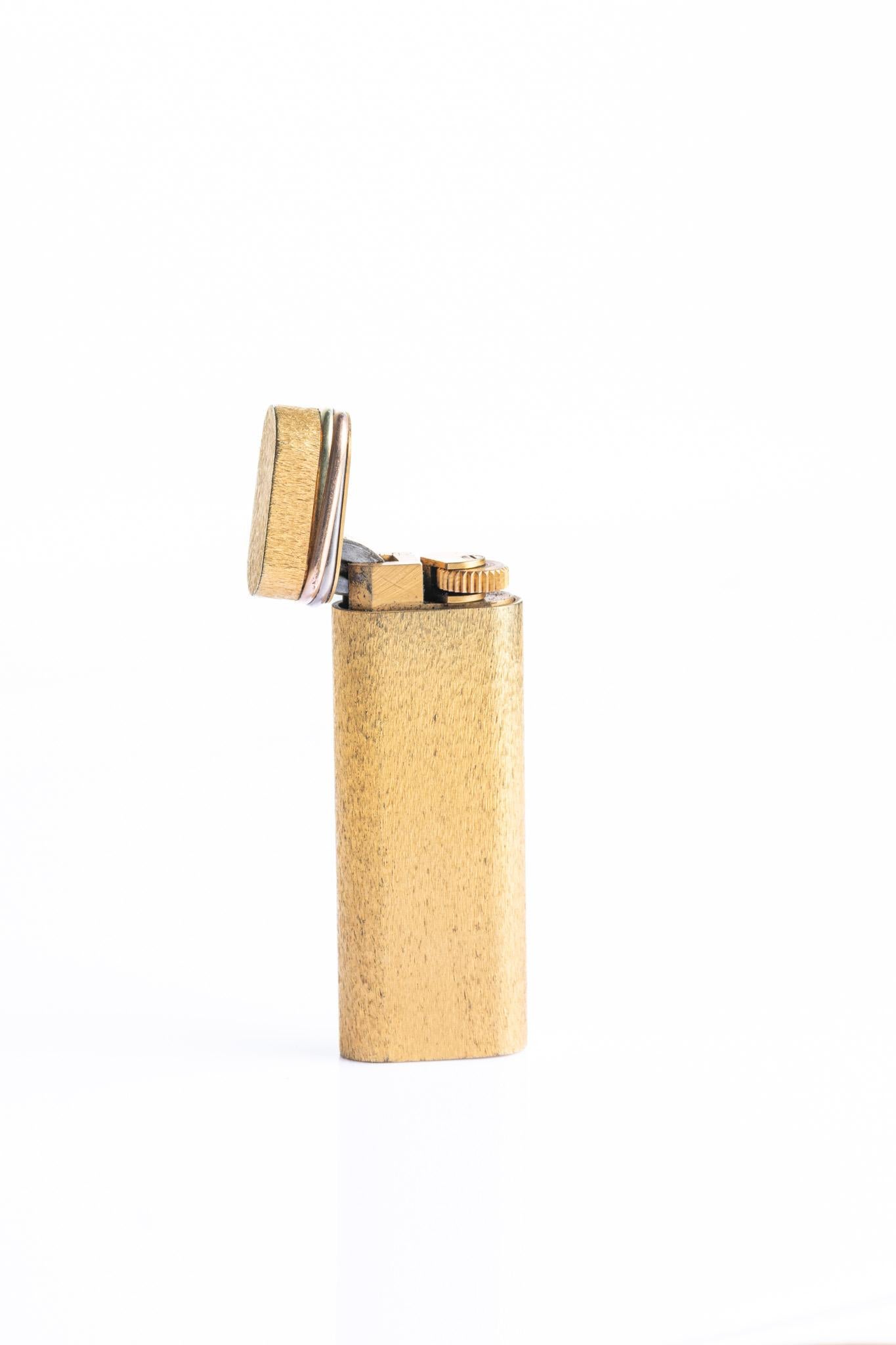 Vintage Cartier Trinity Oval Gold Plated Lighter With Original Box Unisexe en vente