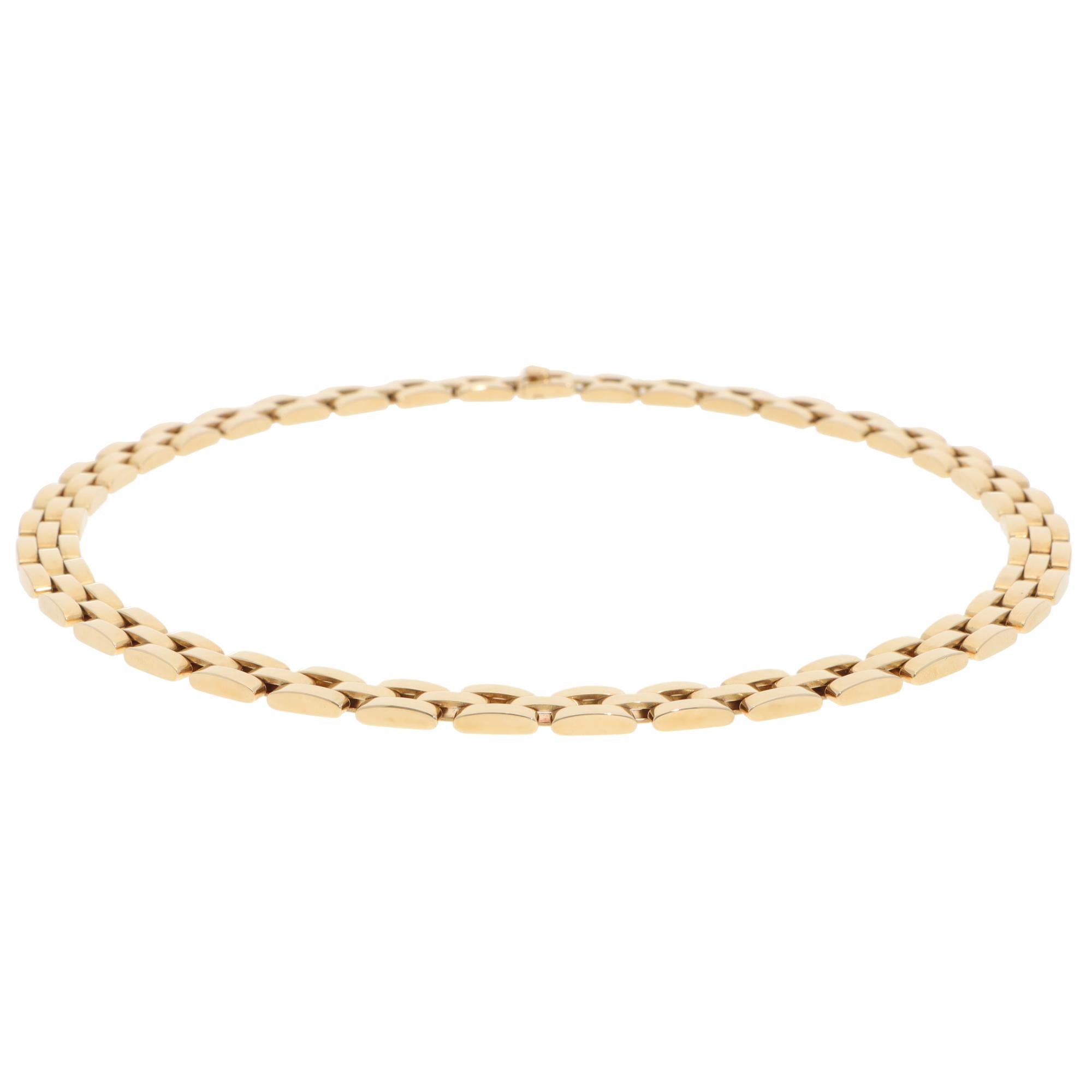 Una bellissima collana vintage Cartier Tyrana Maillon Panthère in oro giallo 18 carati.

La collana è composta da maglie piatte in oro giallo massiccio, collegate con l'iconico design a mattoni di Maillon Panthère. Questo particolare design è la