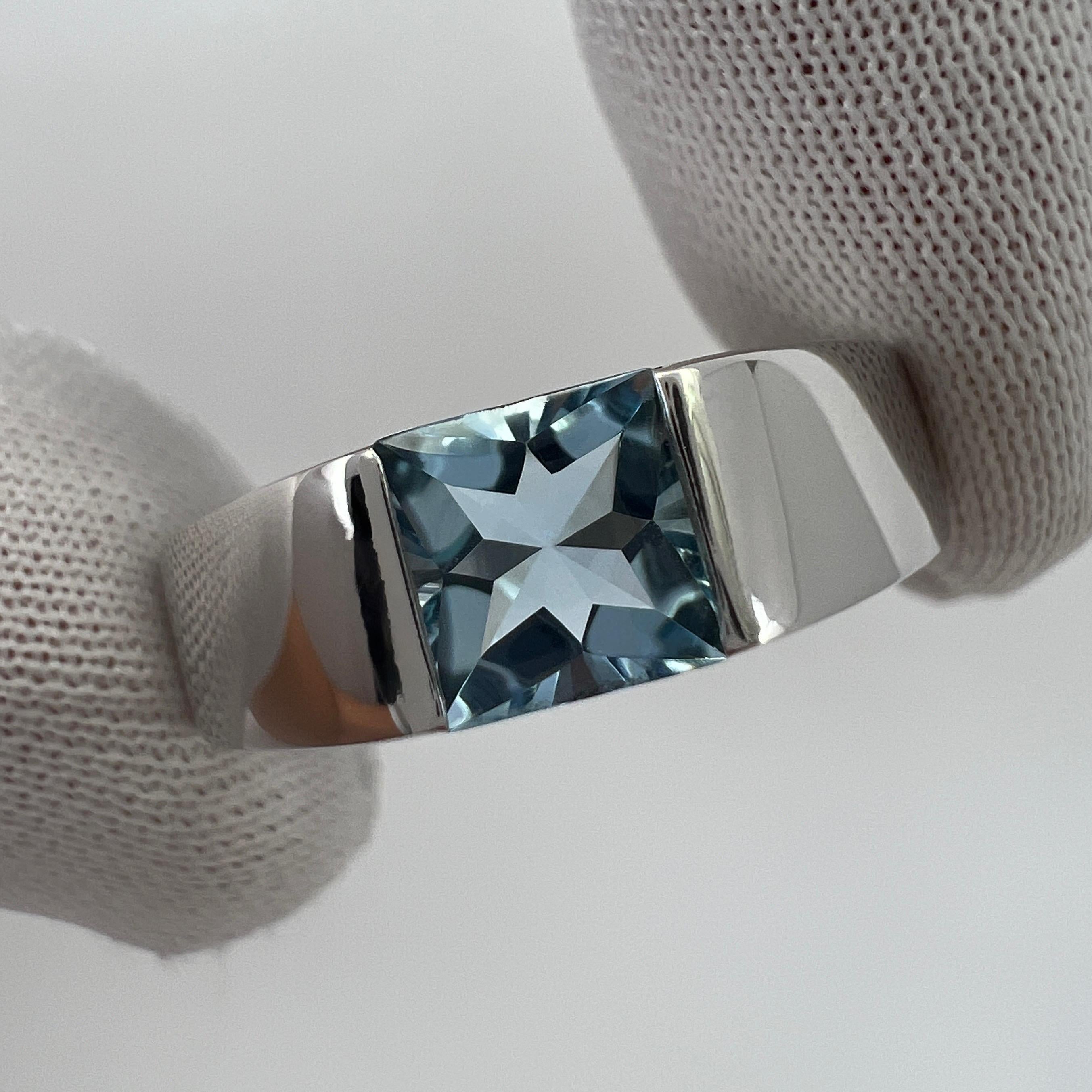 Vintage Cartier Vivid Blue Aquamarine 18 Karat White Gold Tank Ring.

Stunning white gold ring with a 6mm tension set fine blue aquamarine.

Fine jewellery houses like Cartier only use the finest of gemstones and this aquamarine is no exception. A