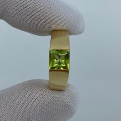 Vintage Cartier Vivid Green Peridot 18 Karat Yellow Gold Tank Band Ring