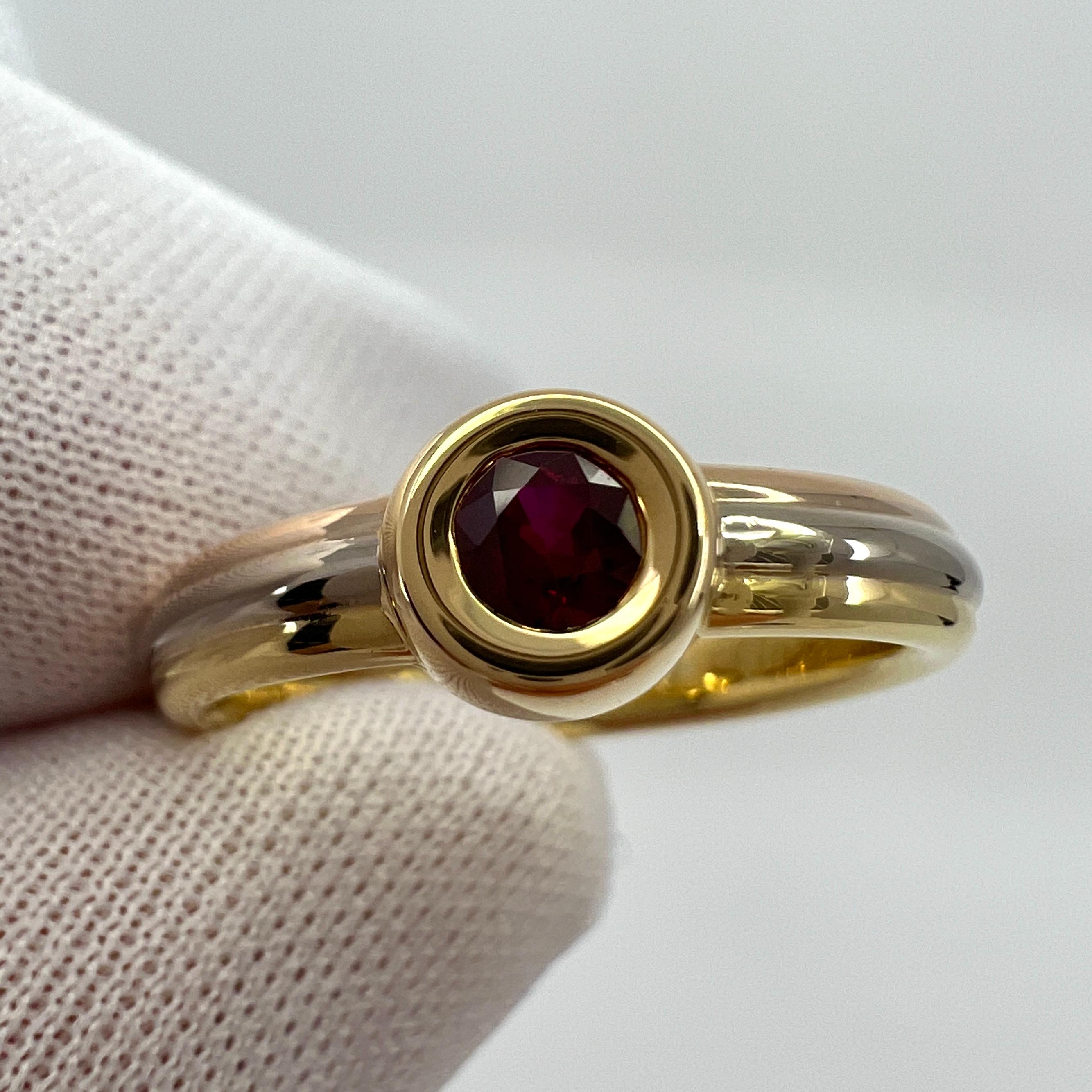 Vintage Cartier Round Cut Ruby 18k Tri Colour/Multi Tone Gold Solitaire Ring.

Stunning multi tone gold ring set with a fine vivid red ruby. Fine jewellery houses like Cartier only use the finest of gemstones and this ruby is no exception. A top