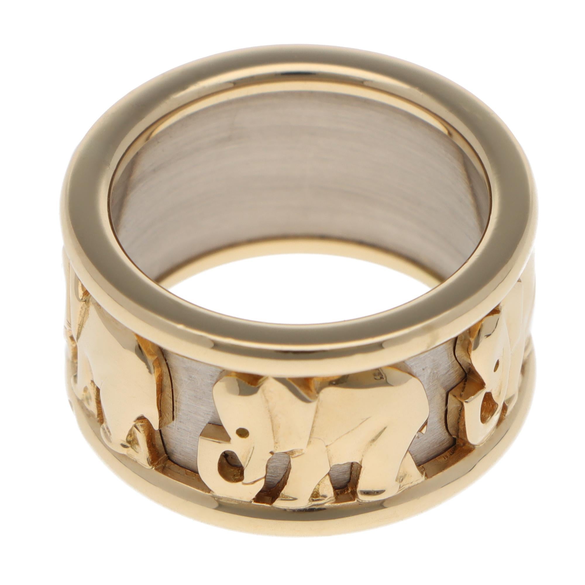 A truly beautiful vintage Cartier walking elephant ring set in 18k yellow and white gold.

From a now discontinued design by Cartier, the ring is set with three polished yellow gold walking elephant motifs, each individually detailed to show the