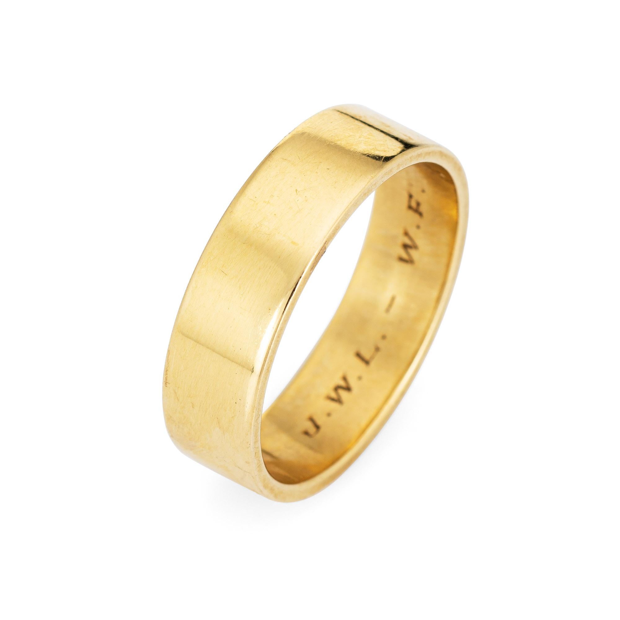 Vintage Cartier wedding band crafted in 18 karat yellow gold (circa 1935).  

The classic wedding band is wider in scale measuring 6mm wide (0.23 inches). The inner band is engraved 