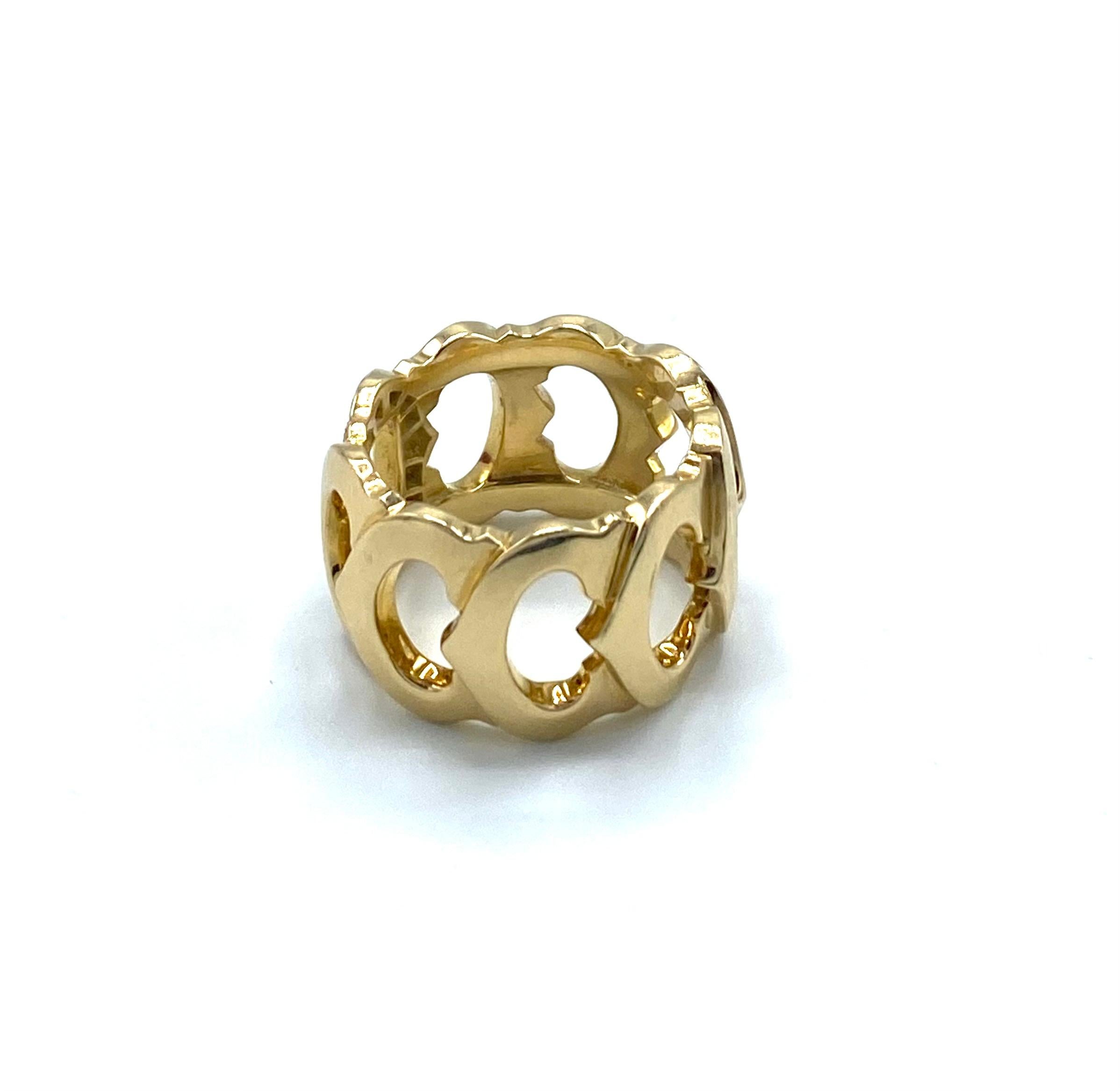 Product details:

The ring is designed by Cartier, it is made out of 18 karat yellow gold and approximately 0.33 cts. of round brilliant cut diamond E/F - VVS. It features C pattern design. The ring comes with the original vintage Cartier