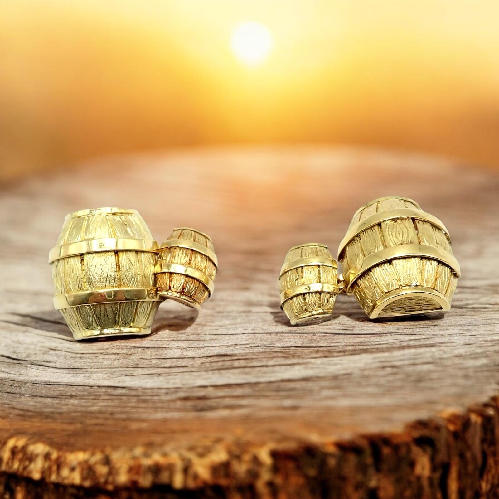 The Rare Vintage Cartier 18k Yellow Gold Barrel Cufflinks from the 1970s are a luxurious statement piece.  Crafted in 18k yellow gold, these barrel-shaped cufflinks feature Cartier's iconic detail of design. 

Their timeless elegance and exceptional