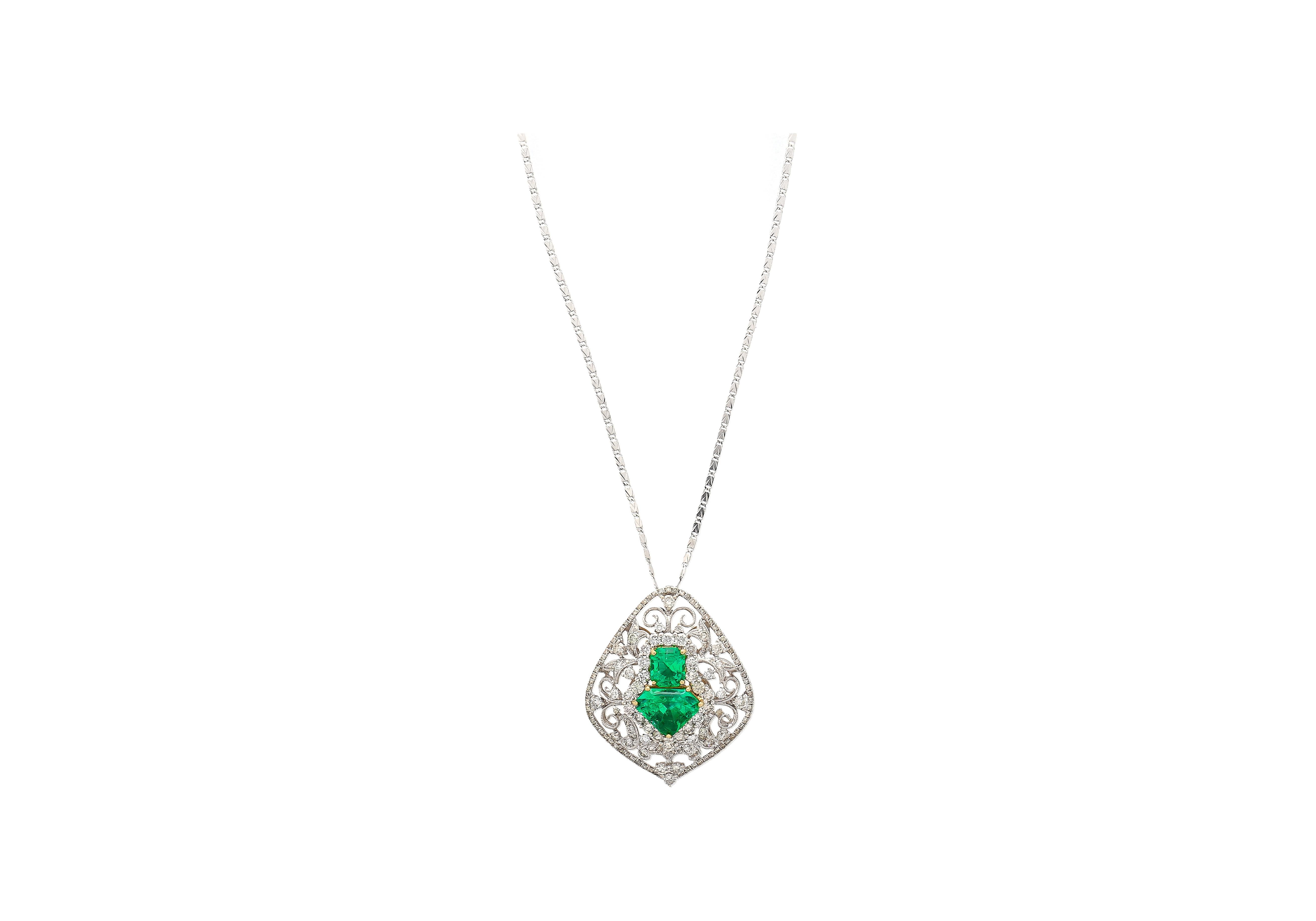 Art Nouveau Vintage Carved 18K White Gold Pendant Necklace With Shield Cut Emeralds For Sale