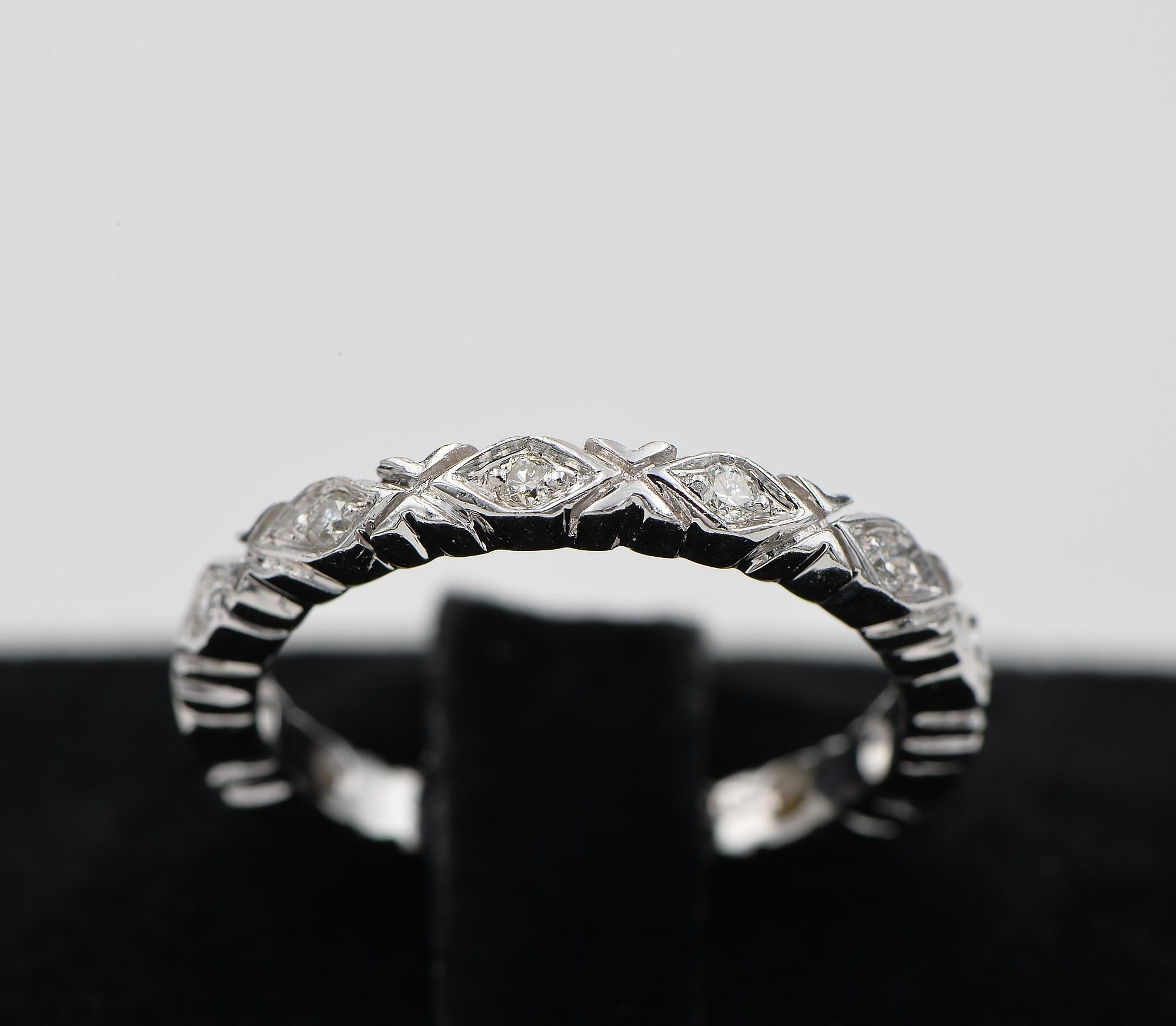 This very pretty full eternity ring is 1945 ca
Hand created of solid 18 KT gold with gorgeous engraving motifs, highlighted by .50 CT of round brilliant cut Diamonds G VS/SI - width is 2.5 mm. with 3.7 grams gross weight
Crisp and fine condition
